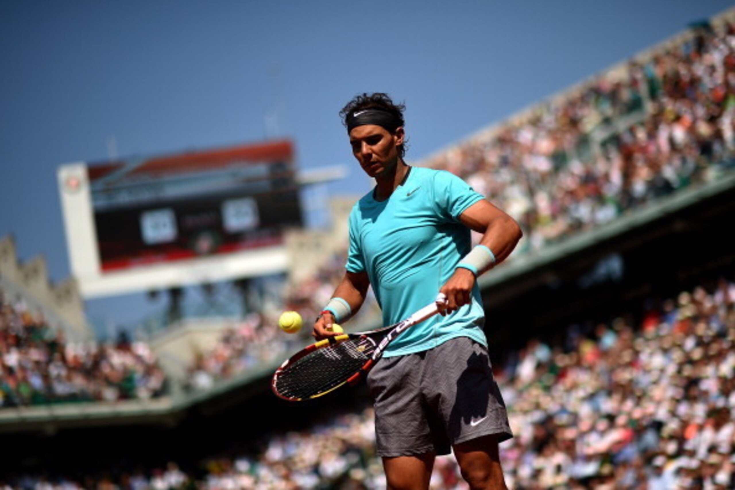 PARIS, FRANCE - MAY 31:  Rafael Nadal of Spain prepares to serve during his men's singles match against Leonardo Mayer of Argentina on day seven of the French Open at Roland Garros on May 31, 2014 in Paris, France.  (Photo by Matthias Hangst/Getty Images)