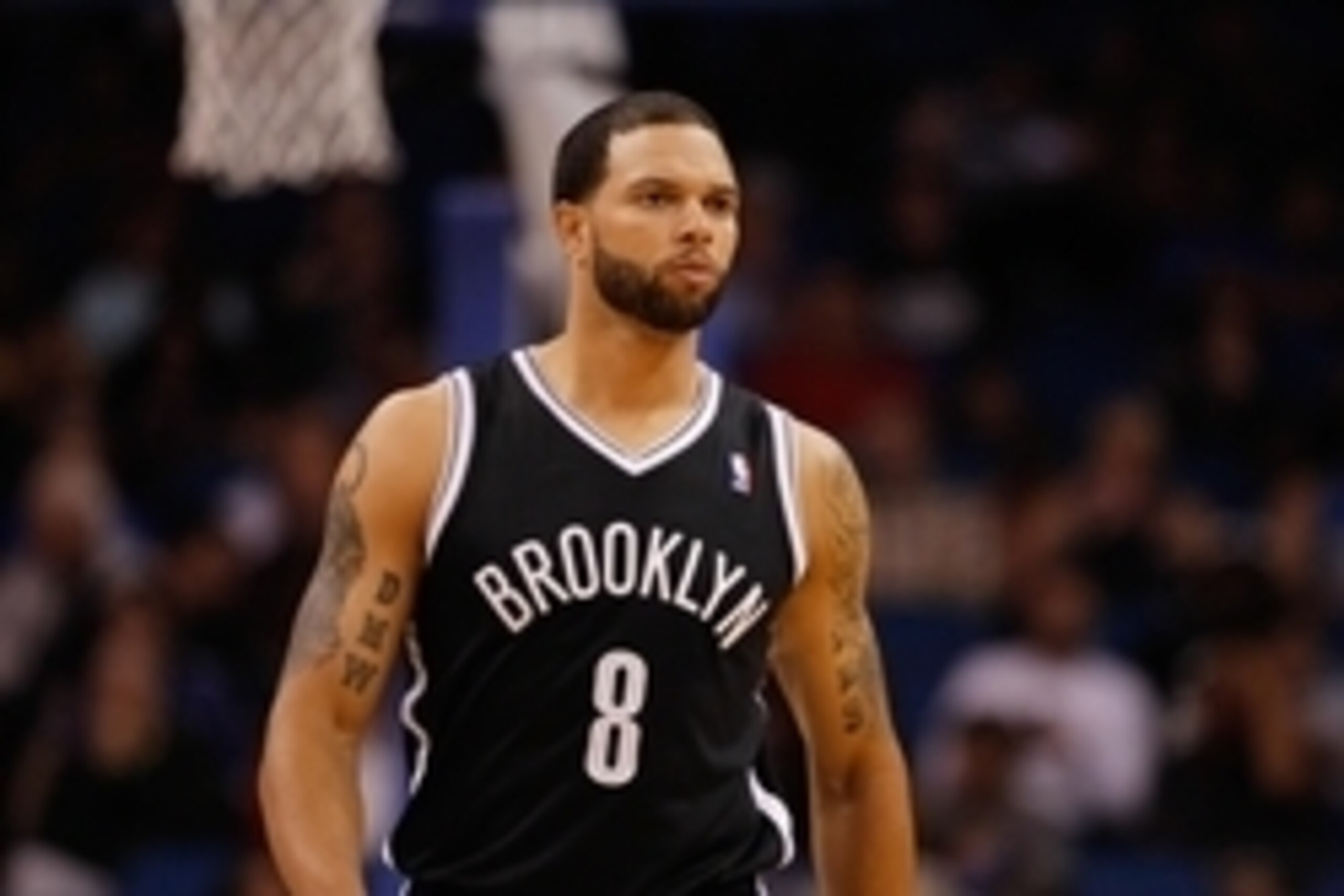 Apr 9, 2014; Orlando, FL, USA; Brooklyn Nets guard Deron Williams (8) against the Orlando Magic during the second quarter at Amway Center. Mandatory Credit: Kim Klement-USA TODAY Sports