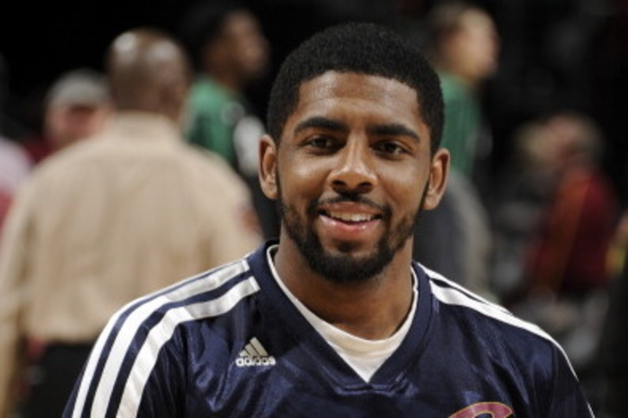 CLEVELAND, OH - APRIL 12: Kyrie Irving #2 of the Cleveland Cavaliers smiles during warm ups before the game against the Boston Celtics at The Quicken Loans Arena on April 12, 2014 in Cleveland, Ohio. NOTE TO USER: User expressly acknowledges and agrees th CLEVELAND, OH - APRIL 12: Kyrie Irving #2 of the Cleveland Cavaliers smiles during warm ups before the game against the Boston Celtics at The Quicken Loans Arena on April 12, 2014 in Cleveland, Ohio. NOTE TO USER: User expressly acknowledges and agrees th
