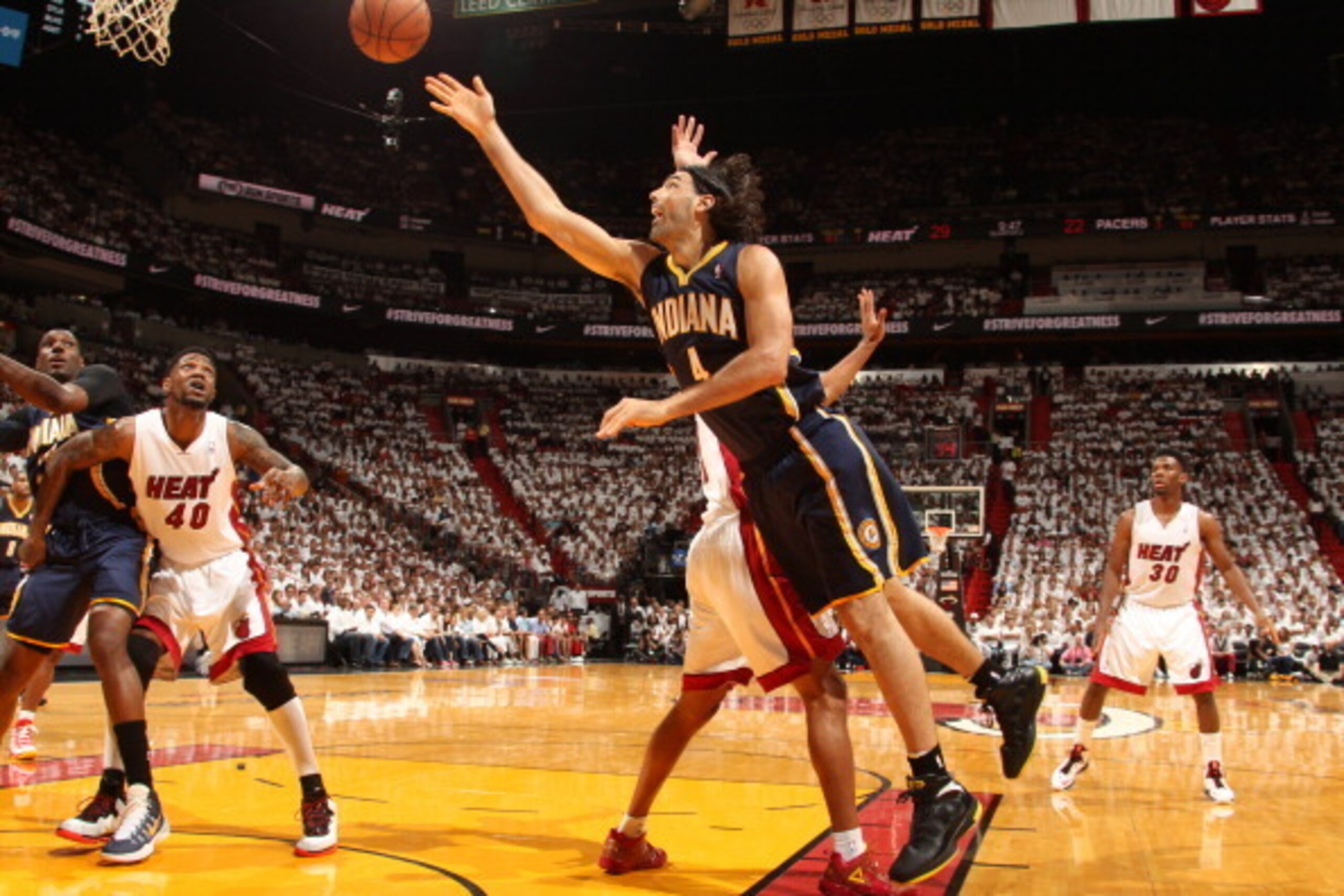 MIAMI, FL - May 26: Luis Scola #4 of the Indiana Pacers shoots against the Miami Heat in Game Four of the Eastern Conference Finals during the 2014 NBA Playoffs at the American Airlines Arena in Miami, Florida on May 26, 2014. NOTE TO USER: User expressly