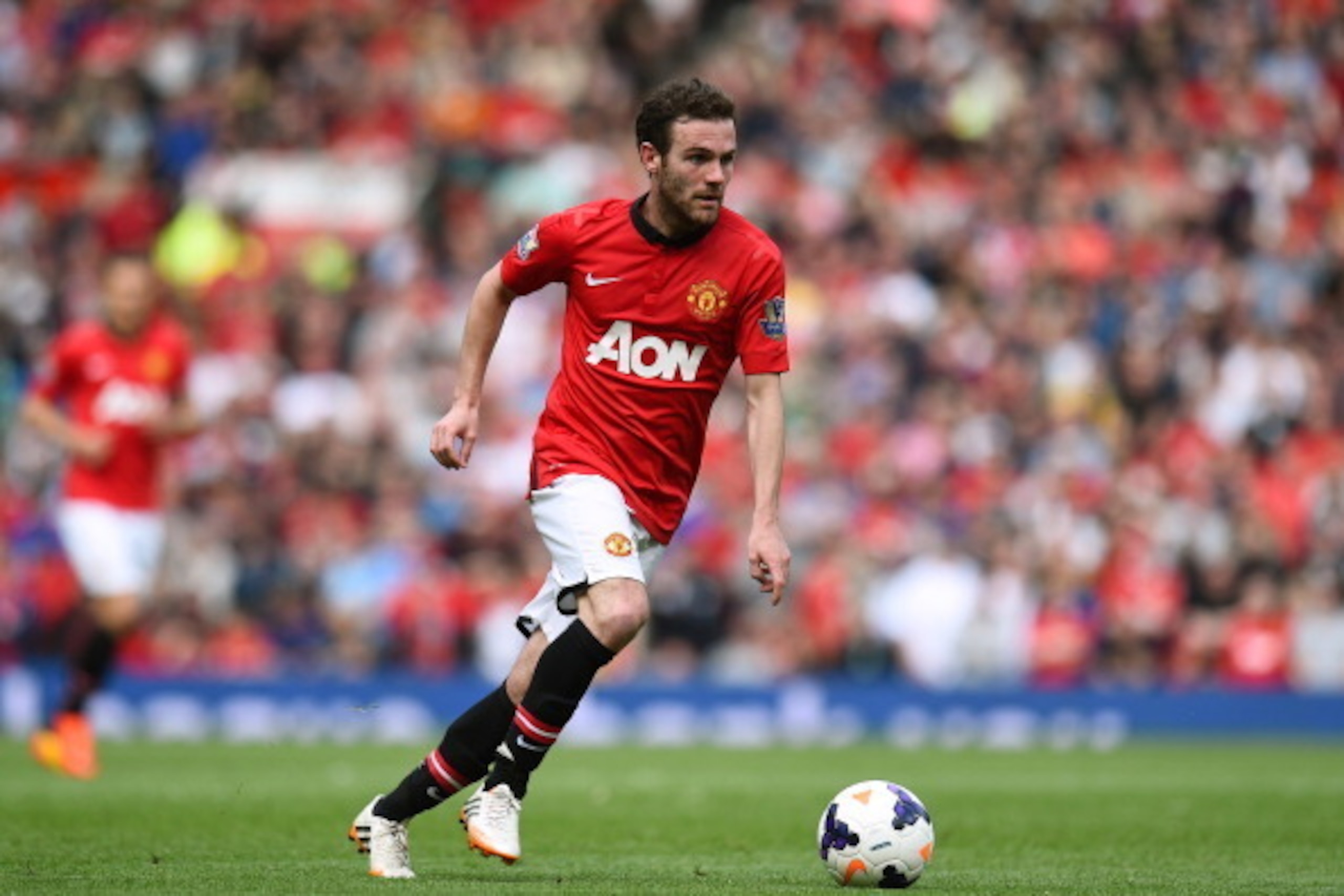 MANCHESTER, ENGLAND - MAY 03:  Juan Mata of Manchester United runs with the ball during the Barclays Premier League match between Manchester United and Sunderland at Old Trafford on May 3, 2014 in Manchester, England.  (Photo by Shaun Botterill/Getty Imag