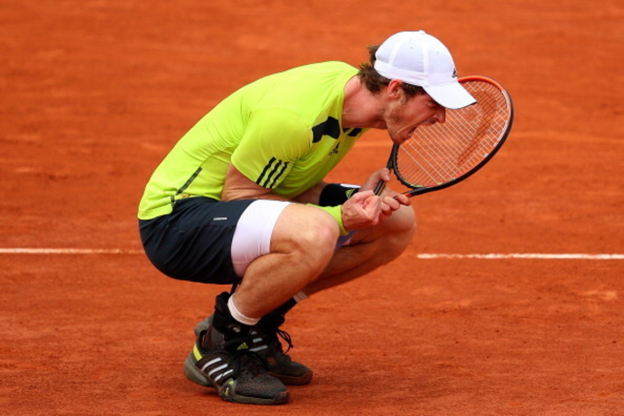 PARIS, FRANCE - JUNE 01:  Andy Murray of Great Britain celebrates victory during his men's singles match against Philipp Kohlschreiber of Germany on day eight of the French Open at Roland Garros on June 1, 2014 in Paris, France.  (Photo by Clive Brunskill
