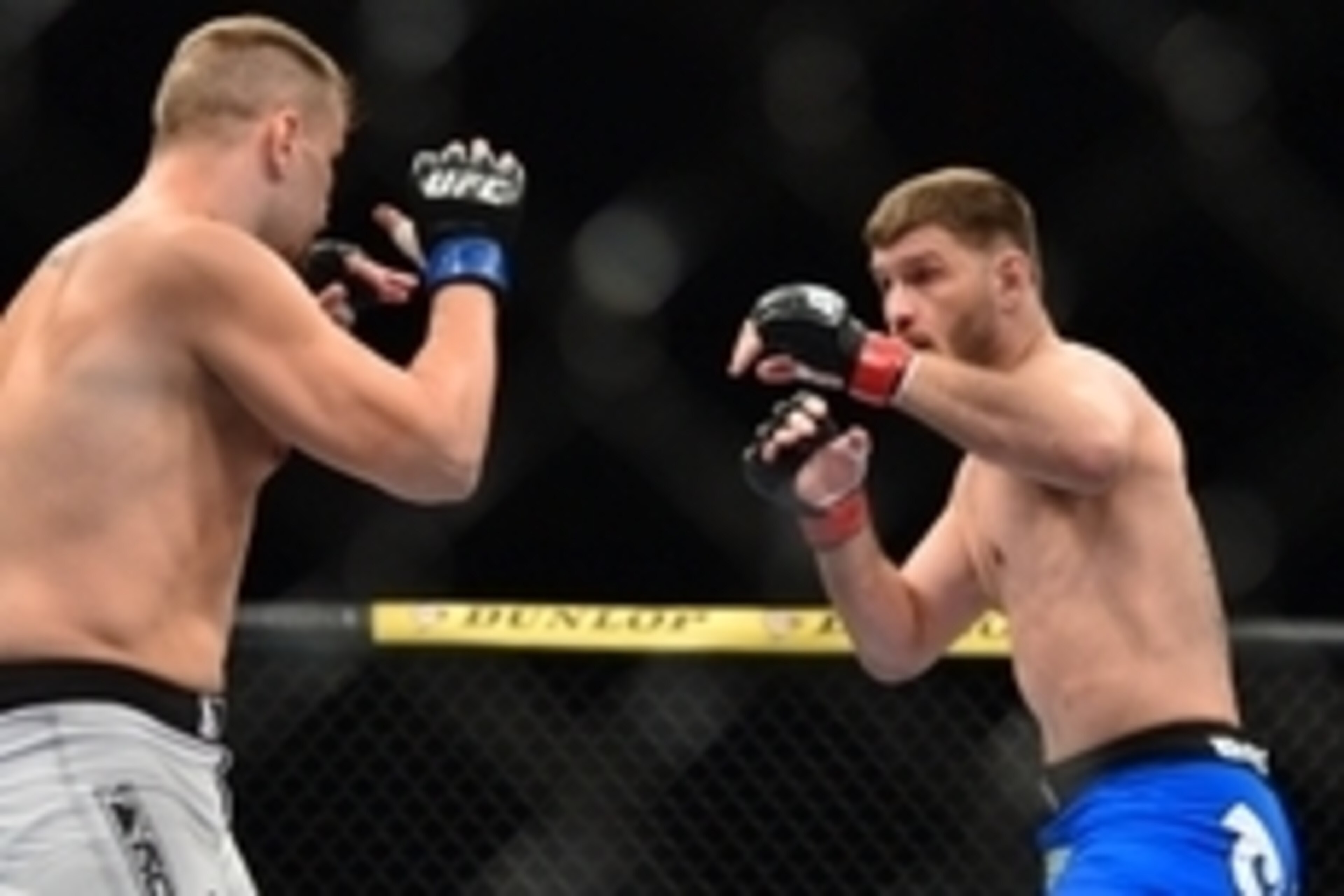 May 31, 2014; Sao Paulo, SP, BRAZIL; Stipe Miocic (red gloves) fights against Fabio Maldonado (blue gloves) during the TUF Brazil 3 Finale at Ibirapuera  Gymnasium. Mandatory Credit: Jason Silva-USA TODAY Sports