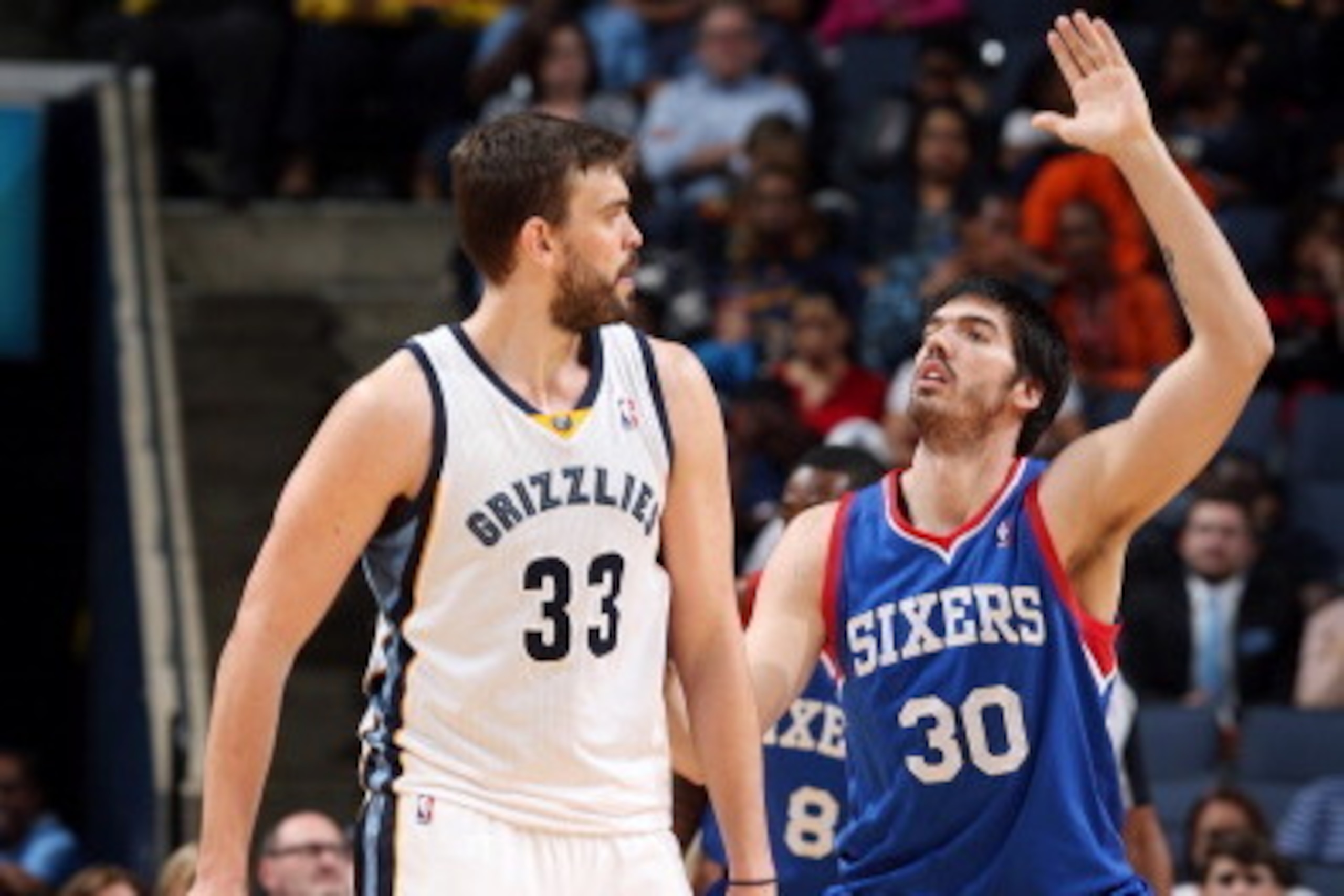 MEMPHIS, TN - APRIL 11: Marc Gasol #33 of the Memphis Grizzlies handles the ball against Byron Mullens #30 of the Philadelphia 76ers on April 11, 2014 at FedExForum in Memphis, Tennessee. NOTE TO USER: User expressly acknowledges and agrees that, by downl