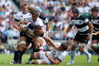 LONDON, ENGLAND - JUNE 01:  Mamuka Gorgodze of the Barbarians is tackled by Luke Wallace and Dave Ewers of England during the Rugby Union International Match between England and The Barbarians at Twickenham Stadium on June 1, 2014 in London, England.  (Ph