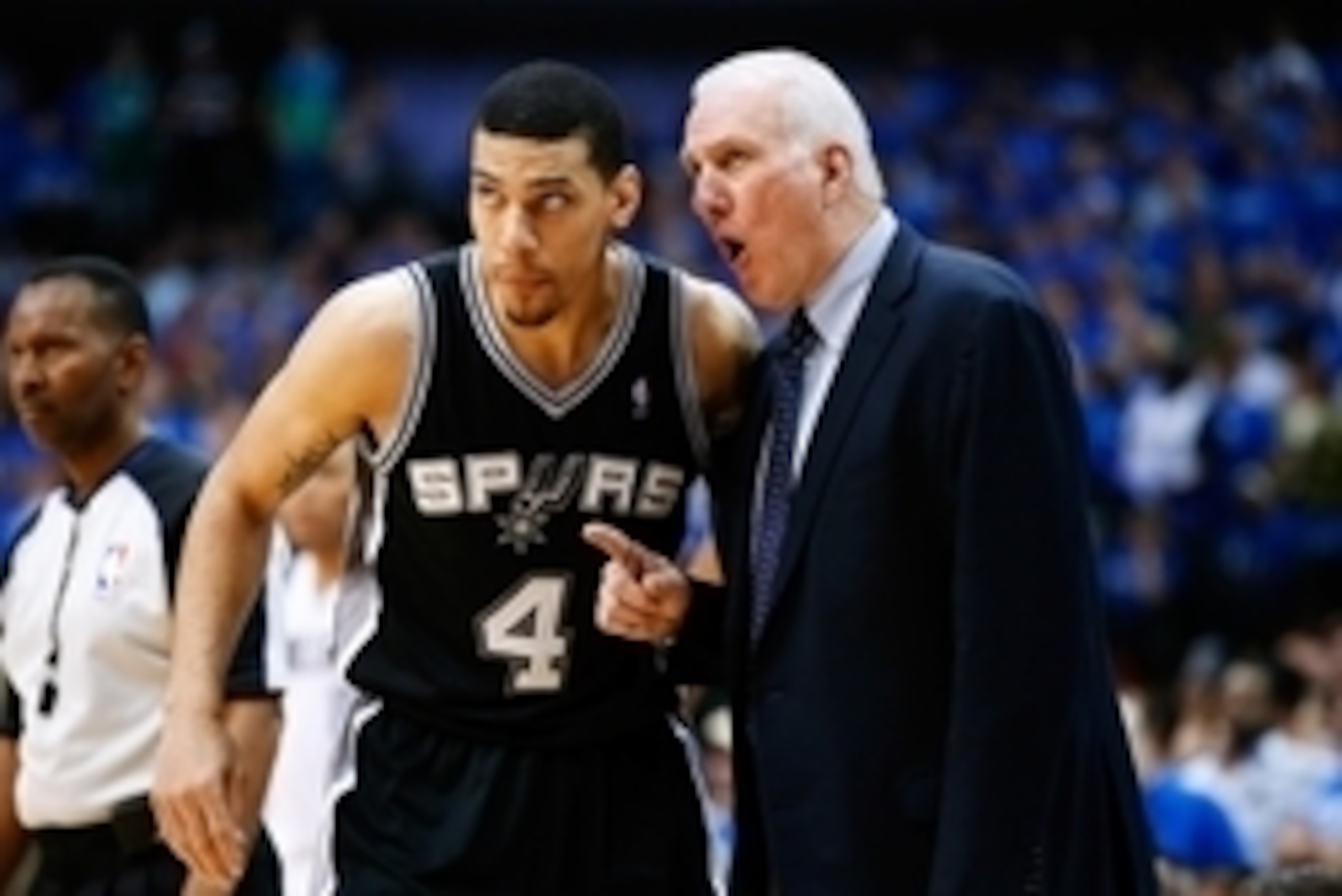 May 2, 2014; Dallas, TX, USA; San Antonio Spurs head coach Gregg Popovich speaks to guard Danny Green (4) during the game against the Dallas Mavericks in game six of the first round of the 2014 NBA Playoffs at American Airlines Center. Mandatory Credit: K