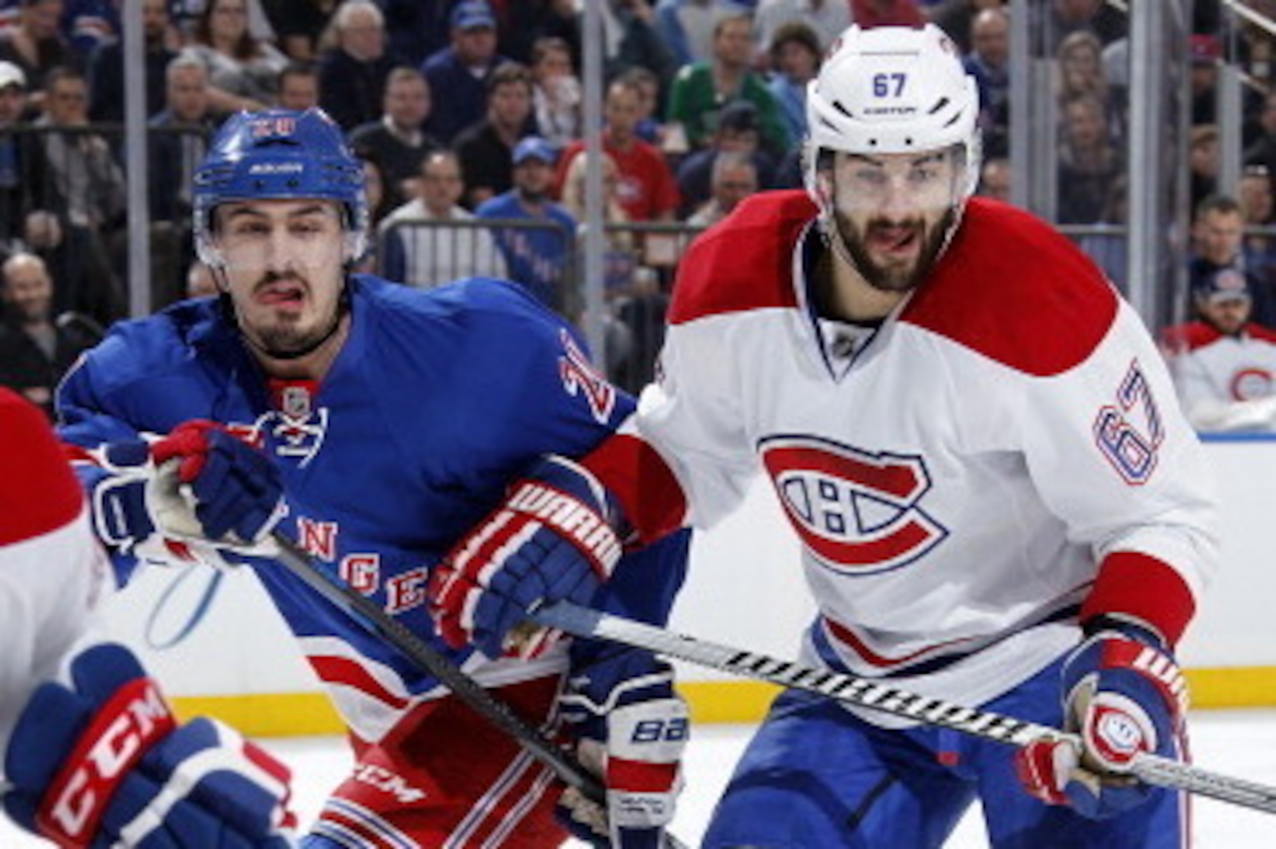 NEW YORK, NY - MAY 25:  Chris Kreider #20 of the New York Rangers skates against Max Pacioretty #67 of the Montreal Canadiens in the first period of Game Four of the Eastern Conference Final against during the 2014 NHL Stanley Cup Playoffs at Madison Squa