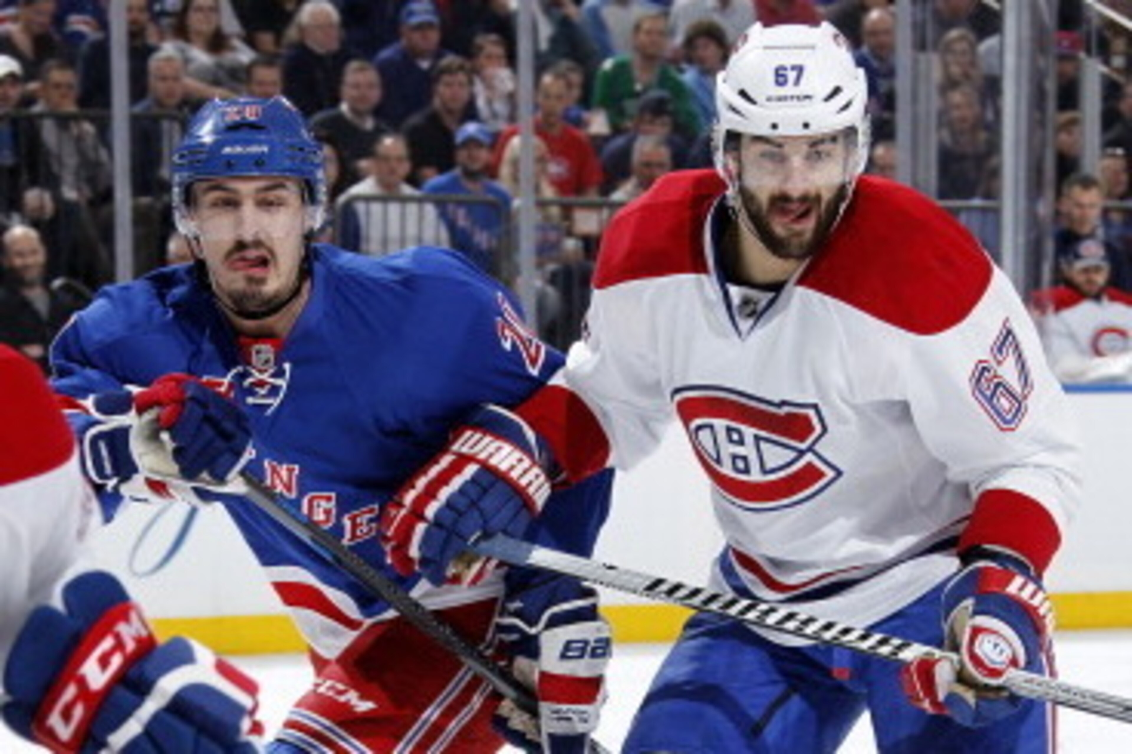 NEW YORK, NY - MAY 25:  Chris Kreider #20 of the New York Rangers skates against Max Pacioretty #67 of the Montreal Canadiens in the first period of Game Four of the Eastern Conference Final against during the 2014 NHL Stanley Cup Playoffs at Madison Squa