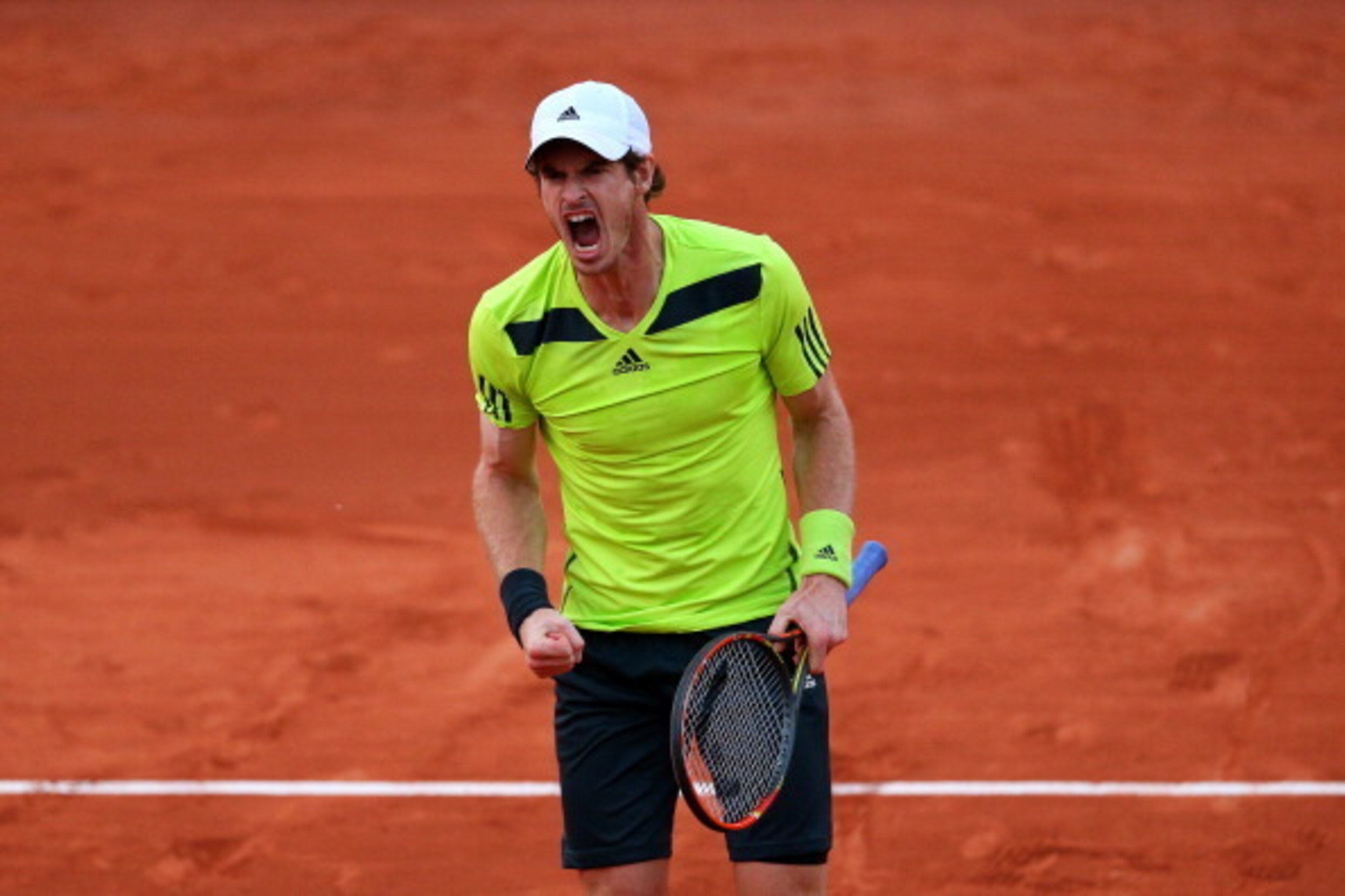 PARIS, FRANCE - MAY 31:  Andy Murray of Great Britain celebrates a point during his men's singles match against Philipp Kohlschreiber of Germany on day seven of the French Open at Roland Garros on May 31, 2014 in Paris, France.  (Photo by Clive Brunskill/