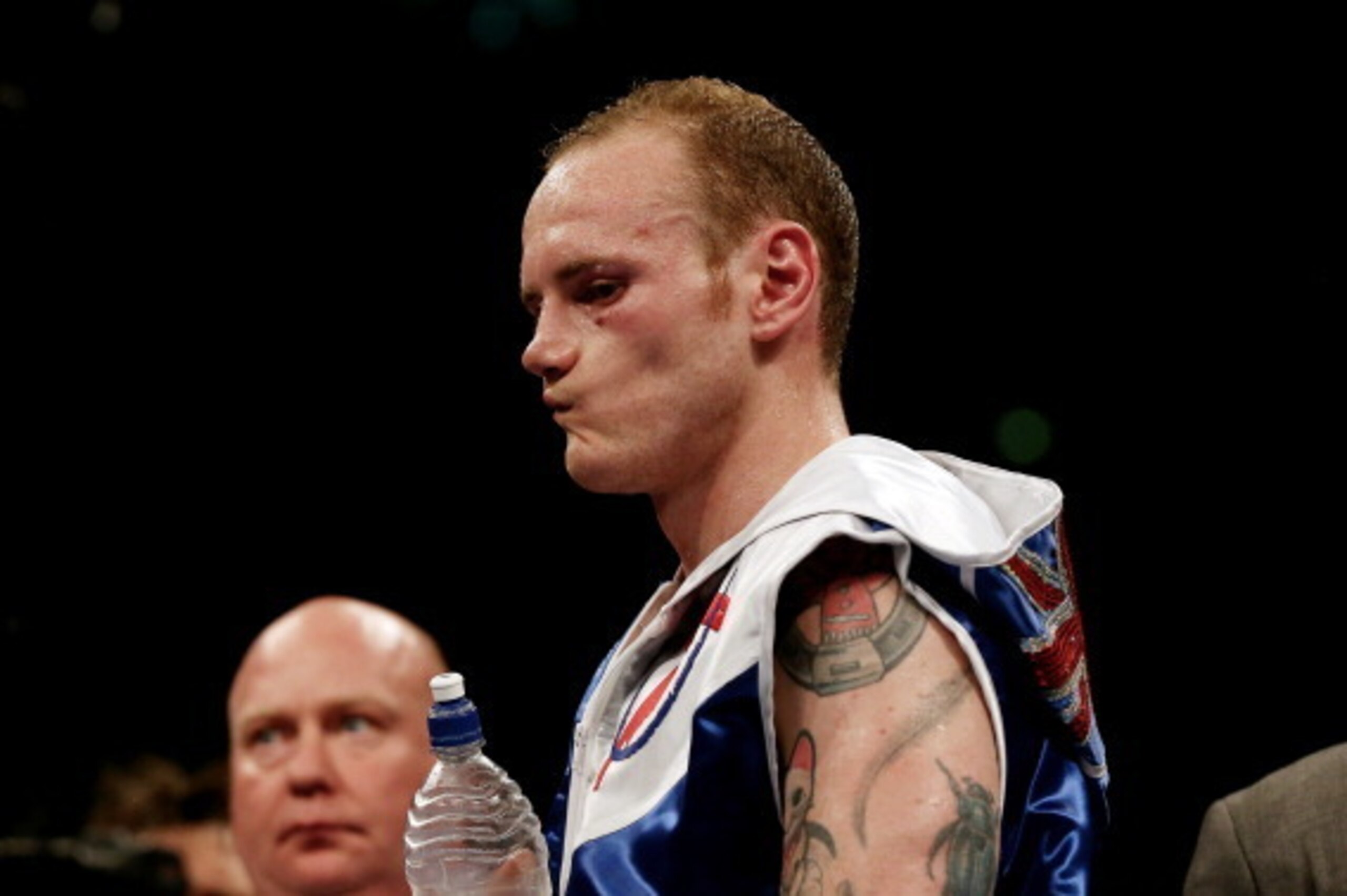 LONDON, ENGLAND - MAY 31:  George Groves looks dejected after his defeat to Carl Froch in their IBF and WBA World Super Middleweight bout at Wembley Stadium on May 31, 2014 in London, England.  (Photo by Scott Heavey/Getty Images)