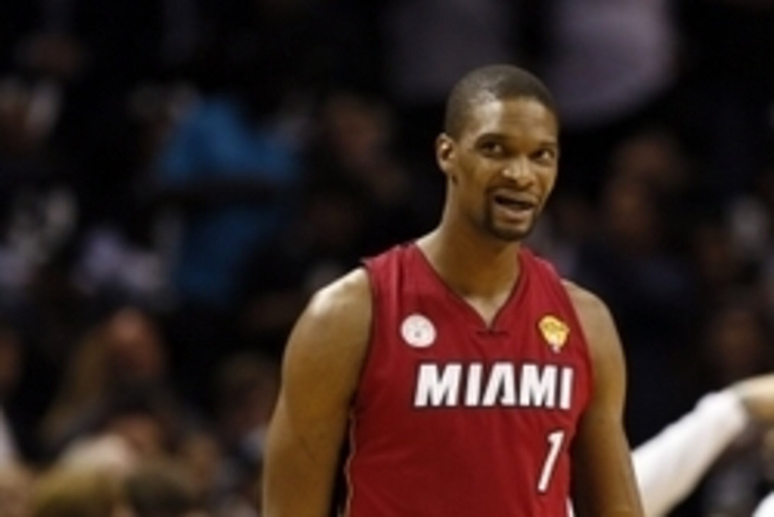 Jun 11, 2013; San Antonio, TX, USA; Miami Heat center Chris Bosh (1) reacts during the first quarter of game three of the 2013 NBA Finals against the San Antonio Spurs at the AT&T Center. Mandatory Credit: Soobum Im-USA TODAY Sports Jun 11, 2013; San Antonio, TX, USA; Miami Heat center Chris Bosh (1) reacts during the first quarter of game three of the 2013 NBA Finals against the San Antonio Spurs at the AT&T Center. Mandatory Credit: Soobum Im-USA TODAY Sports