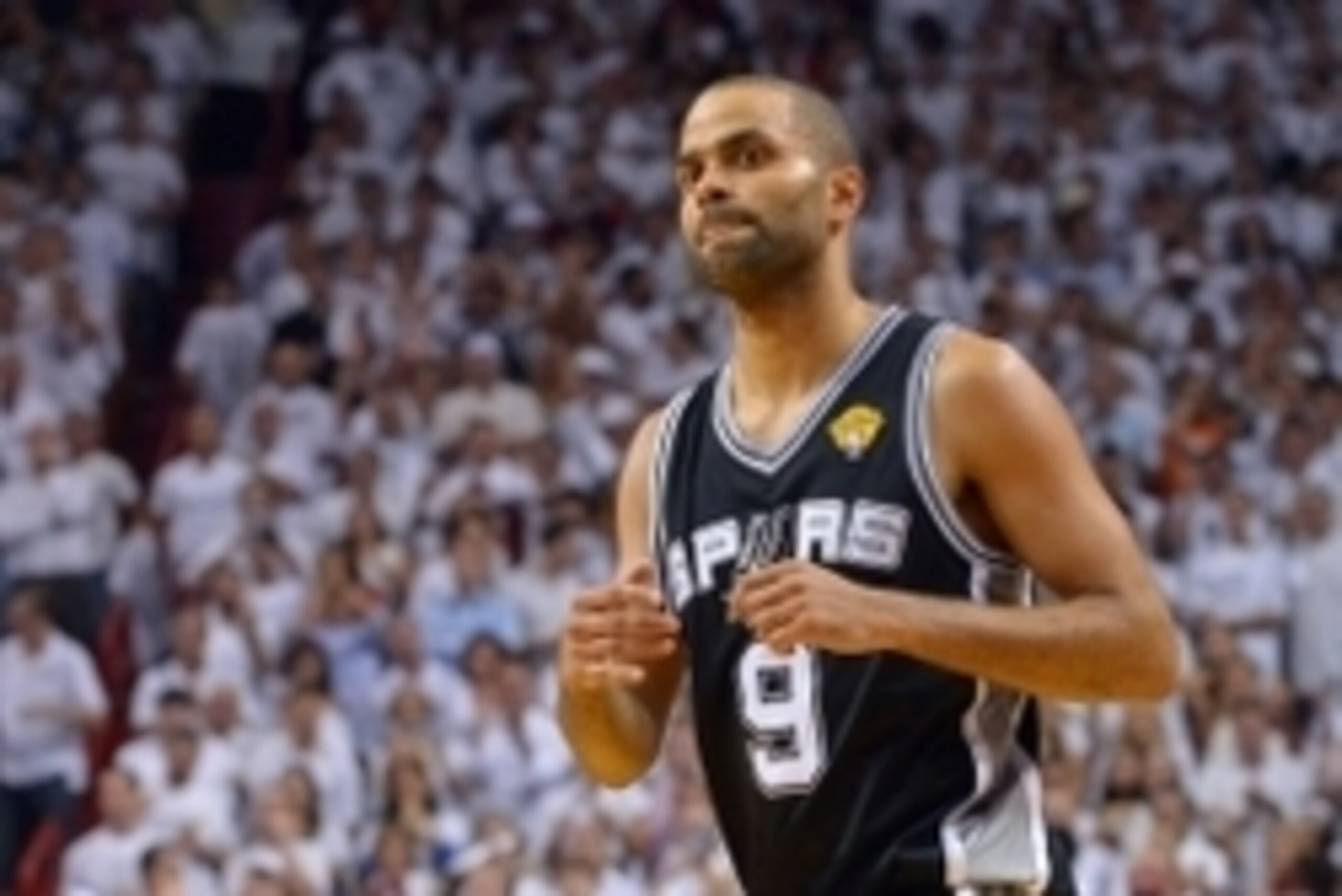 Jun 20, 2013; Miami, FL, USA; San Antonio Spurs point guard Tony Parker (9) reacts during the fourth quarter of game seven in the 2013 NBA Finals against the Miami Heat at American Airlines Arena. Mandatory Credit: Steve Mitchell-USA TODAY Sports Jun 20, 2013; Miami, FL, USA; San Antonio Spurs point guard Tony Parker (9) reacts during the fourth quarter of game seven in the 2013 NBA Finals against the Miami Heat at American Airlines Arena. Mandatory Credit: Steve Mitchell-USA TODAY Sports