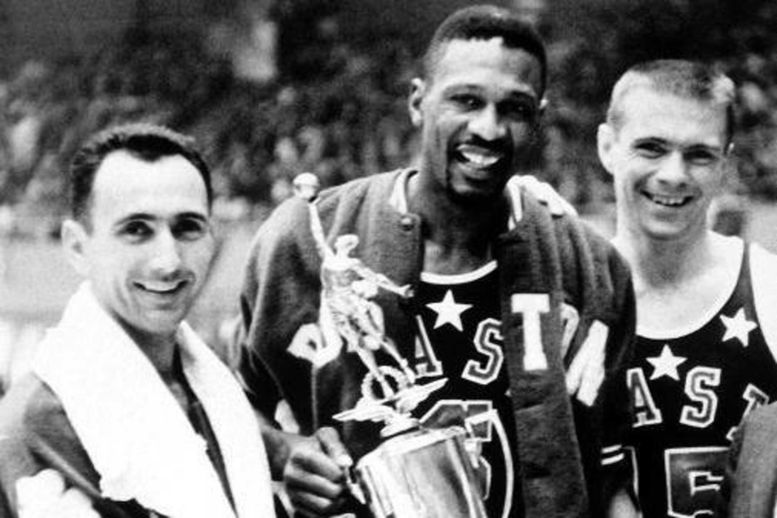 LOS ANGELES - 1963:  (L-R) Bob Cousy #14, Bill Russell #6 and Tom Heinson #15 of the Boston Celtics pose with Bill Russell's NBA All-Star MVP Trophy after the 1963 NBA All Star Game circa 1963 in Los Angeles, California. NOTE TO USER: User expressly ackno