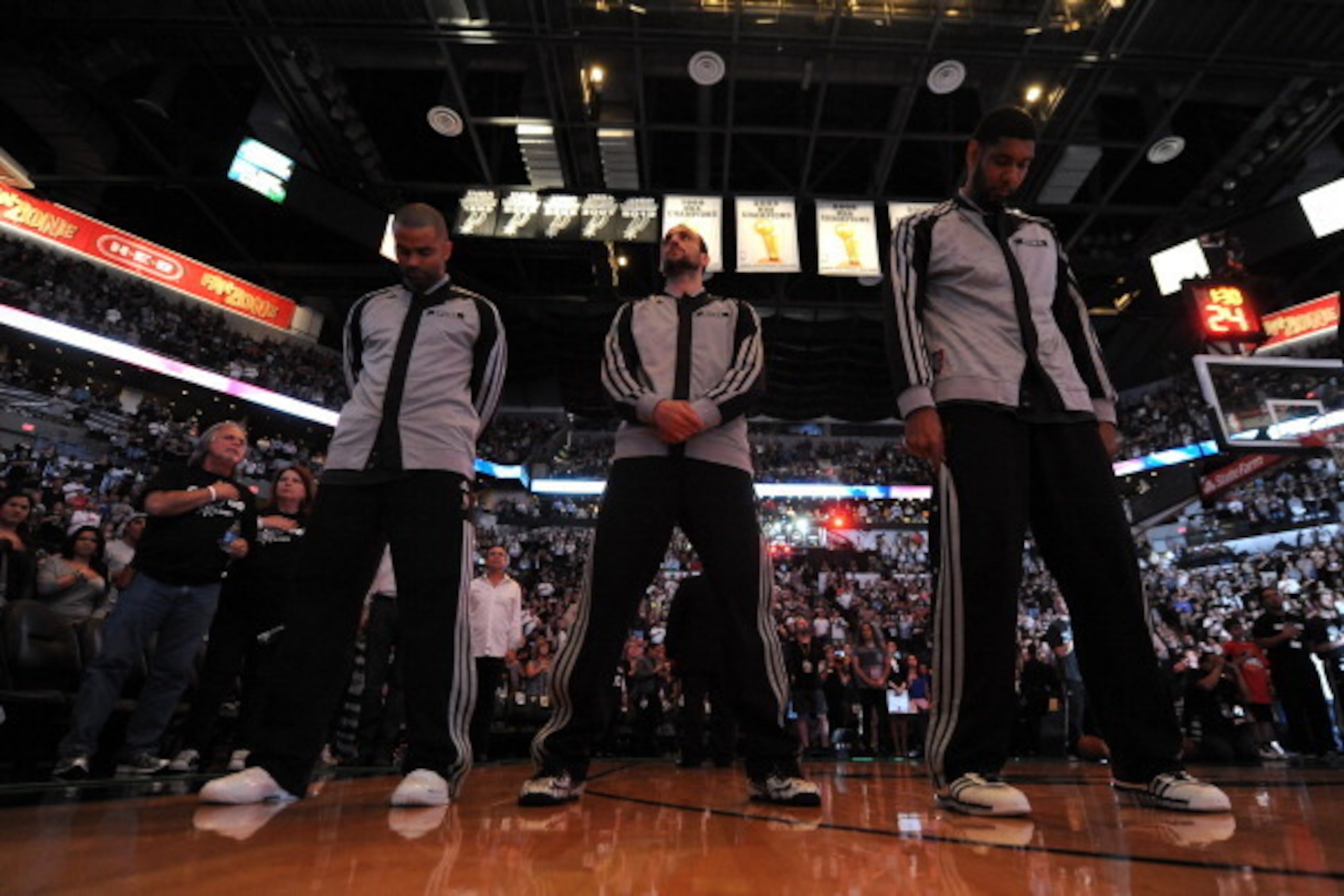 SAN ANTONIO, TX - MAY 21: Tony Parker #9, Tim Duncan #21, and Manu Ginobili #20 of the San Antonio Spurs stand during the National Anthem before Game Two of the Western Conference Finals against the Oklahoma City Thunder during the 2014 NBA Playoffs on Ma