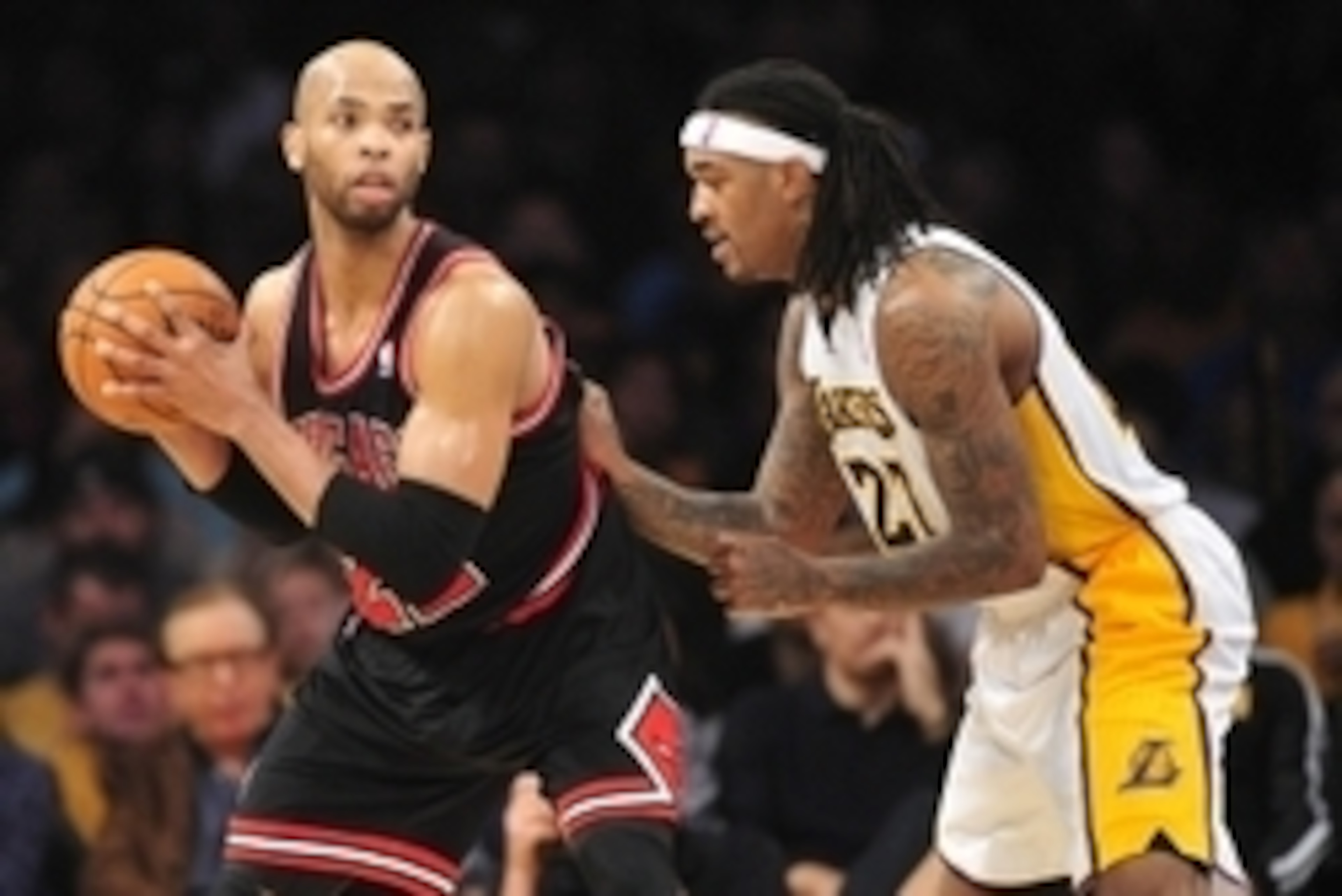 February 9, 2014; Los Angeles, CA, USA; Chicago Bulls power forward Taj Gibson (22) controls the ball against Los Angeles Lakers power forward Jordan Hill (27) during the second half at Staples Center. Mandatory Credit: Gary A. Vasquez-USA TODAY Sports February 9, 2014; Los Angeles, CA, USA; Chicago Bulls power forward Taj Gibson (22) controls the ball against Los Angeles Lakers power forward Jordan Hill (27) during the second half at Staples Center. Mandatory Credit: Gary A. Vasquez-USA TODAY Sports