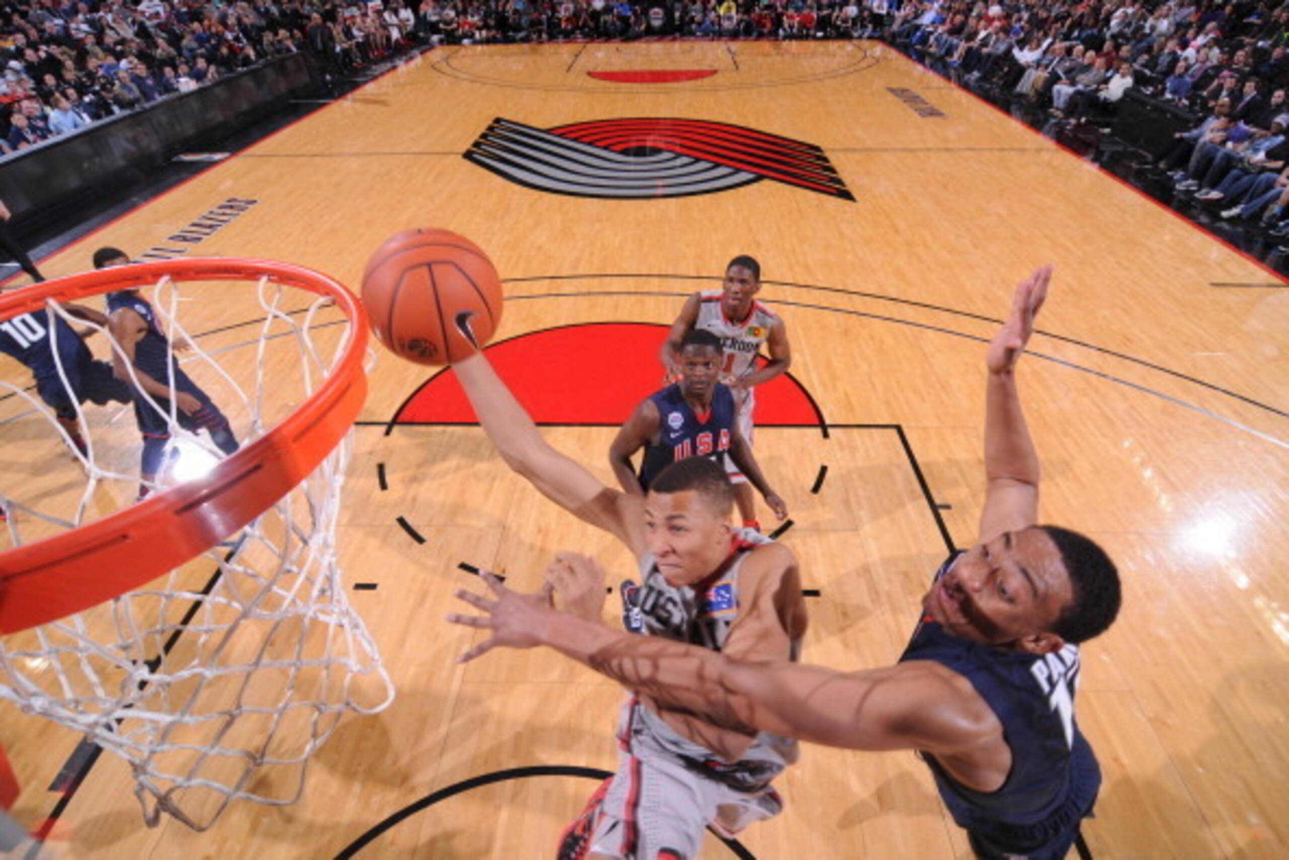 PORTLAND, OR - APRIL 20: Dante Exum #7 of the World Select Team shoots against the USA Junior Select Team during the game on April 20, 2013 at the Rose Garden Arena in Portland, Oregon.  NOTE TO USER: User expressly acknowledges and agrees that, by downlo