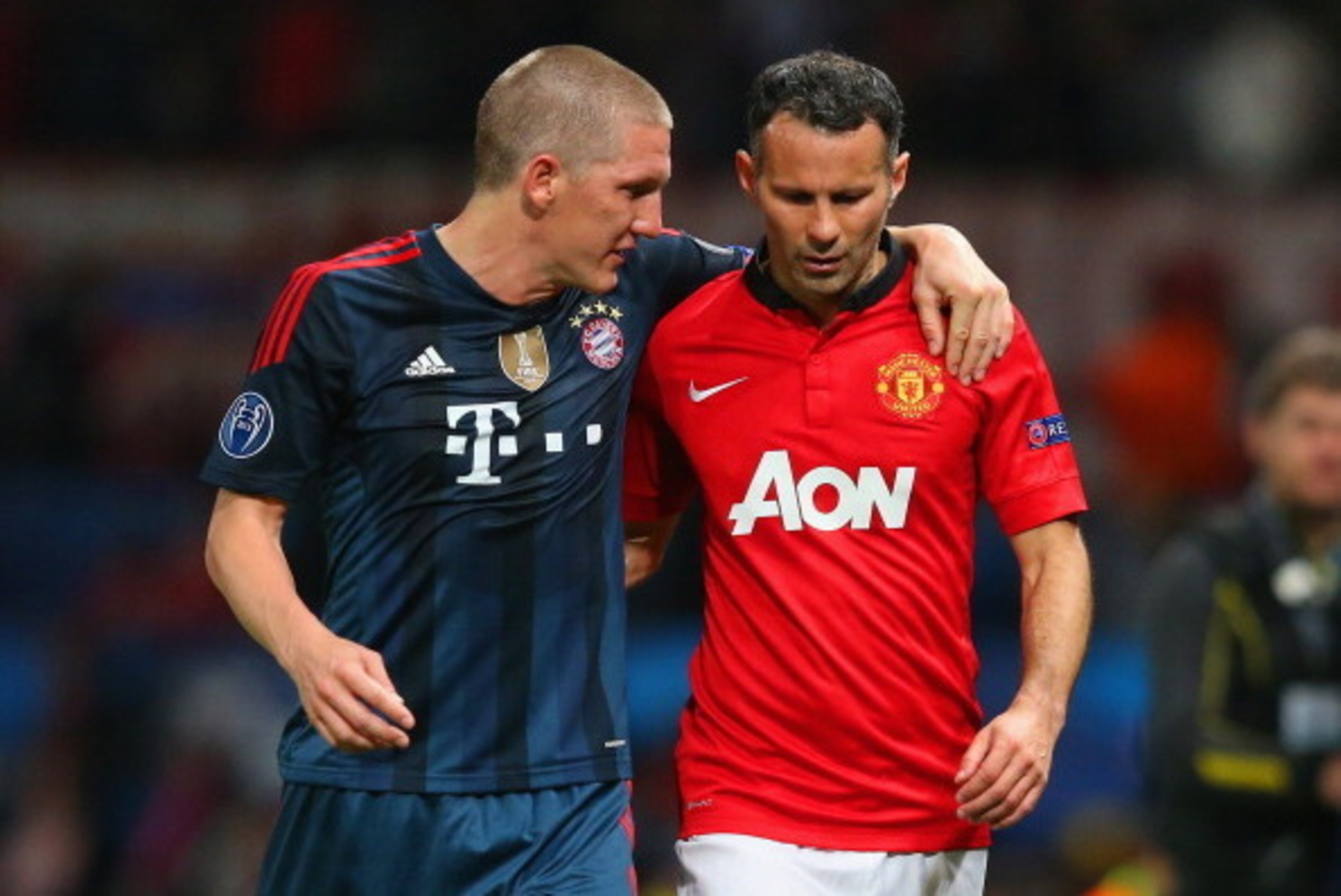MANCHESTER, ENGLAND - APRIL 01:  Bastian Schweinsteiger of Bayern Muenchen and Ryan Giggs of Manchester United walk in at half time during the UEFA Champions League Quarter Final first leg match between Manchester United and FC Bayern Muenchen at Old Traf