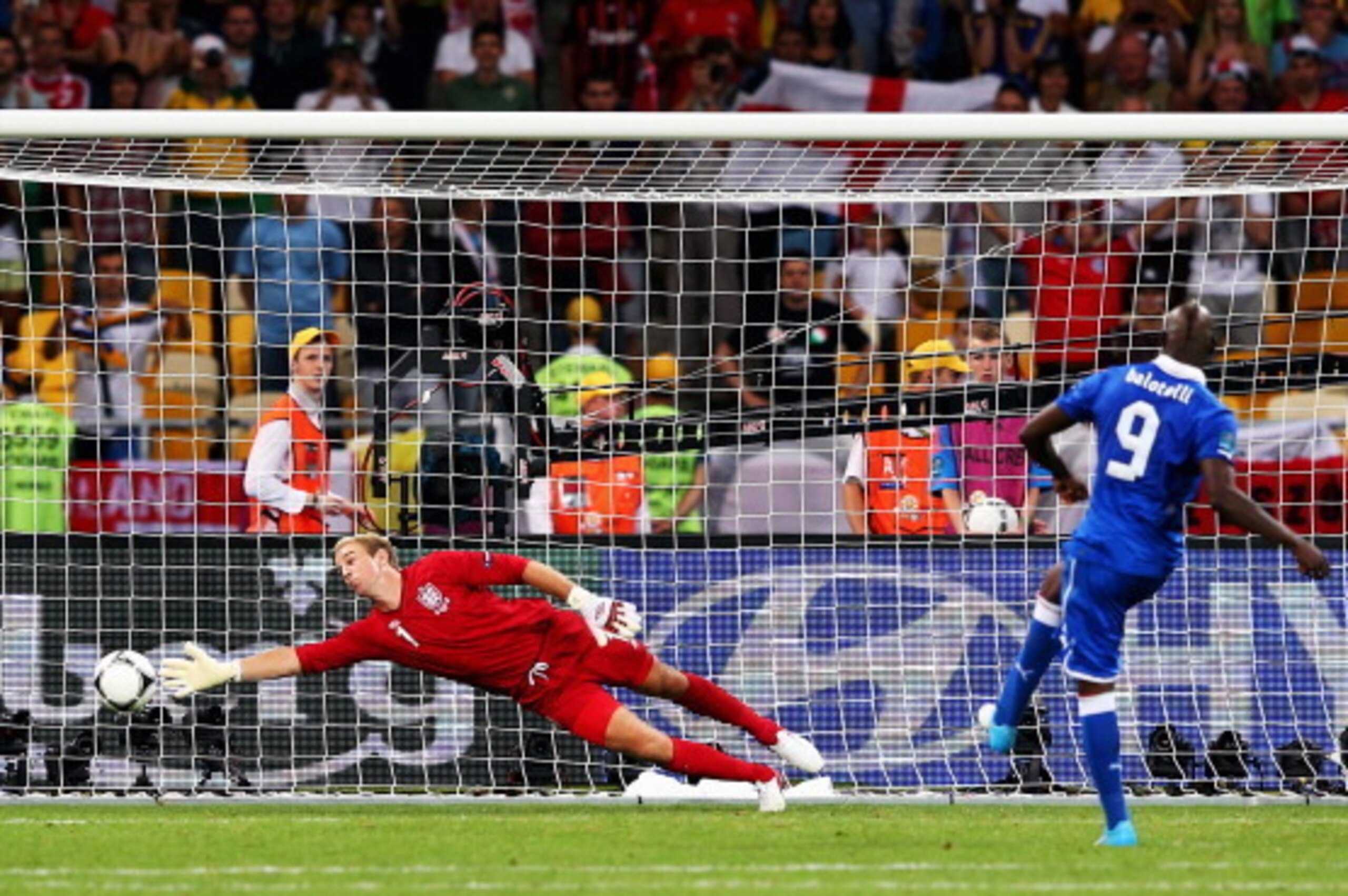KIEV, UKRAINE - JUNE 24: Mario Balotelli of Italy scores his penalty past Joe Hart of England during the shoot out during the UEFA EURO 2012 quarter final match between England and Italy at The Olympic Stadium on June 24, 2012 in Kiev, Ukraine.  (Photo by