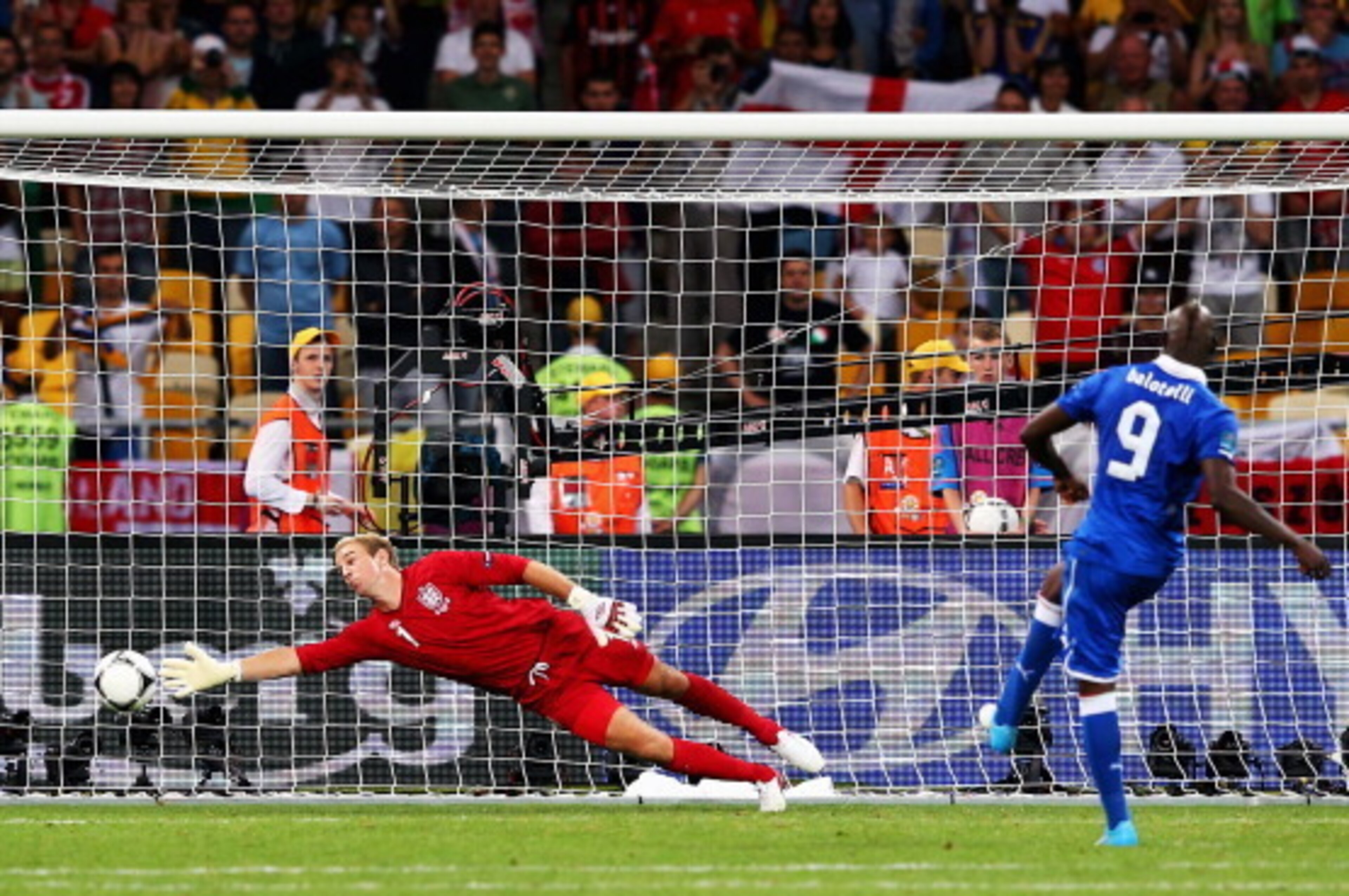 KIEV, UKRAINE - JUNE 24: Mario Balotelli of Italy scores his penalty past Joe Hart of England during the shoot out during the UEFA EURO 2012 quarter final match between England and Italy at The Olympic Stadium on June 24, 2012 in Kiev, Ukraine.  (Photo by