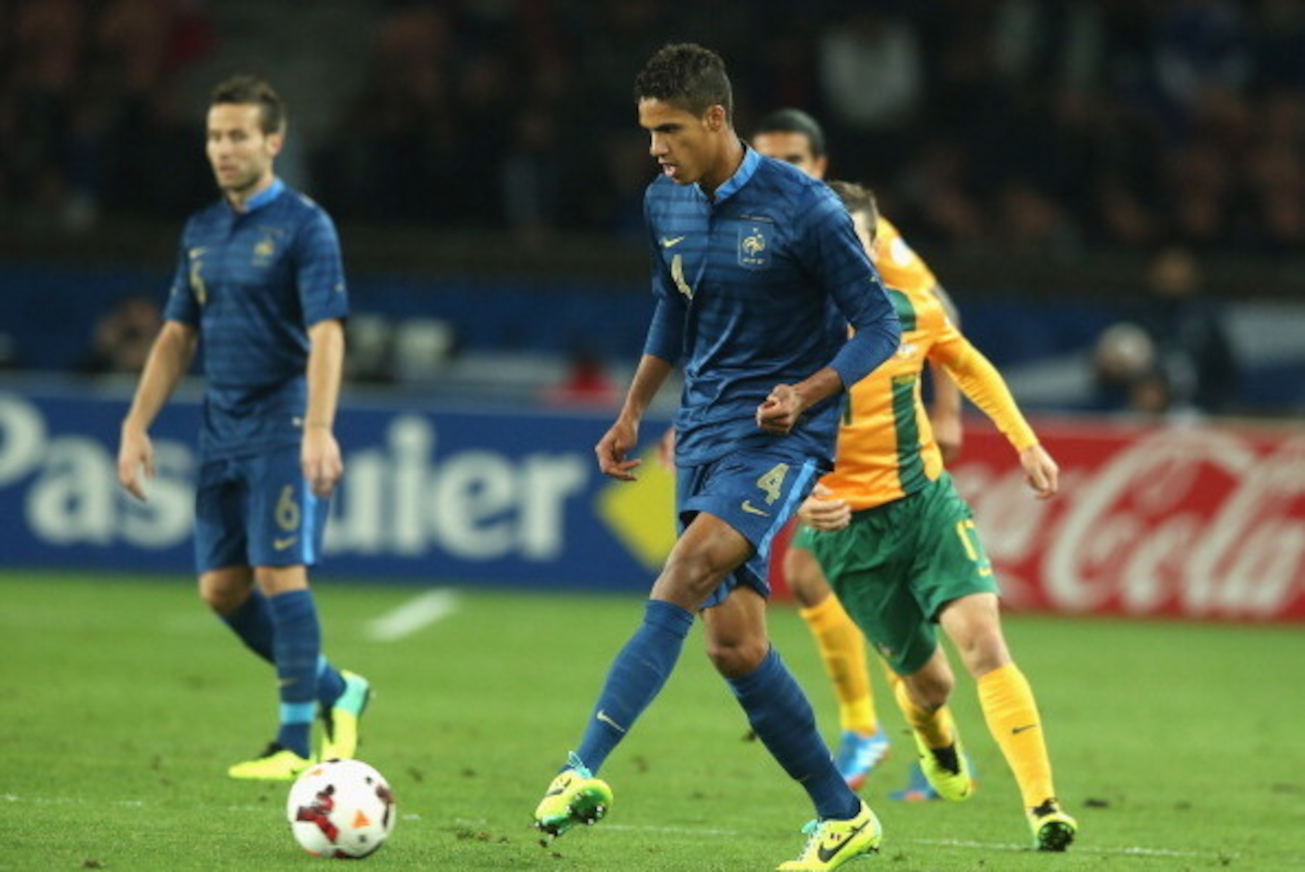 PARIS, FRANCE - OCTOBER 11: Raphael Varane of France passes the ball during the International Friendly match between France and Australia at Parc des Princes on October 11, 2013 in Paris, France. (Photo by David Rogers/Getty Images) PARIS, FRANCE - OCTOBER 11: Raphael Varane of France passes the ball during the International Friendly match between France and Australia at Parc des Princes on October 11, 2013 in Paris, France. (Photo by David Rogers/Getty Images)