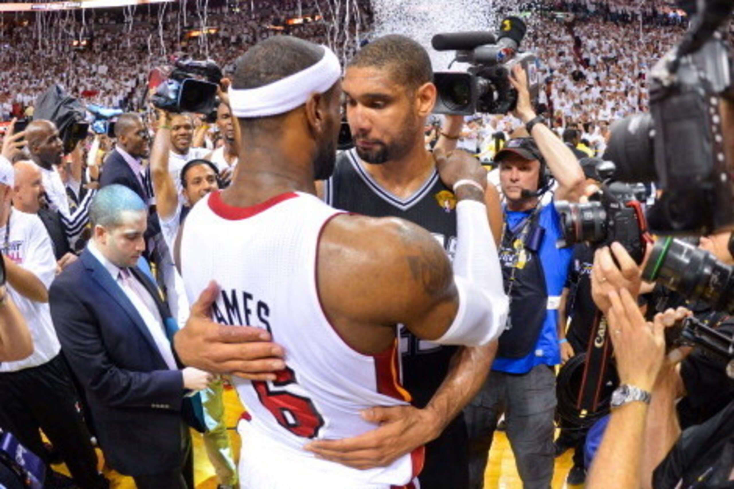 MIAMI, FL - JUNE 20: LeBron James #6 of the Miami Heat greets Tim Duncan #21 of the San Antonio Spurs following the Heat's victory against the Spurs in Game Seven of the 2013 NBA Finals on June 20, 2013 at American Airlines Arena in Miami, Florida. NOTE T
