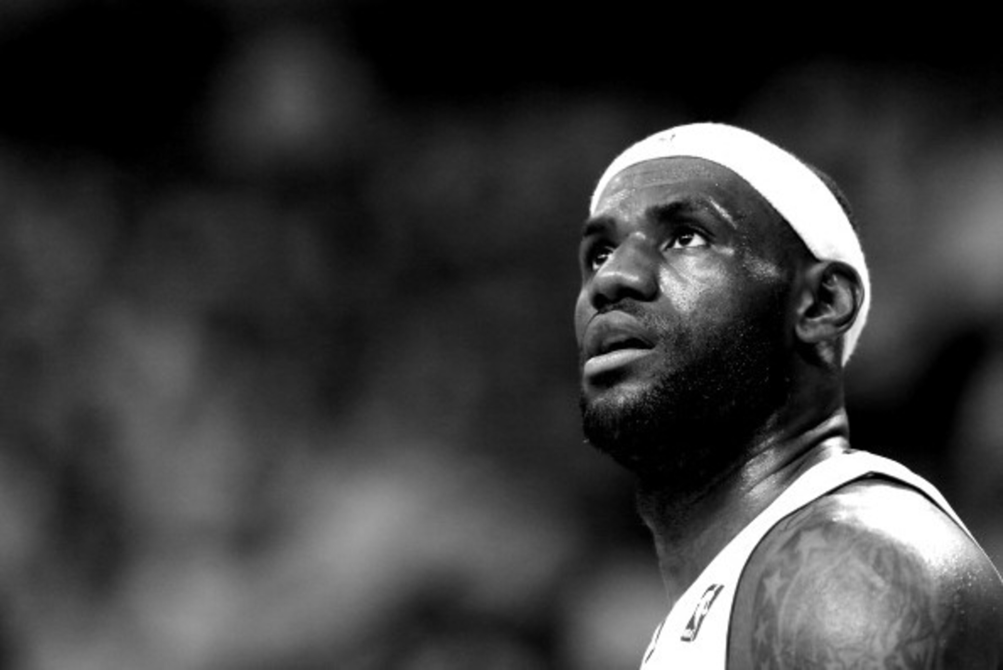 MIAMI, FL - MAY 30: (EDITORS NOTE: Image has been converted to black and white) LeBron James #6 of the Miami Heat looks on against the Indiana Pacers during Game Six of the Eastern Conference Finals of the 2014 NBA Playoffs at American Airlines Arena on M