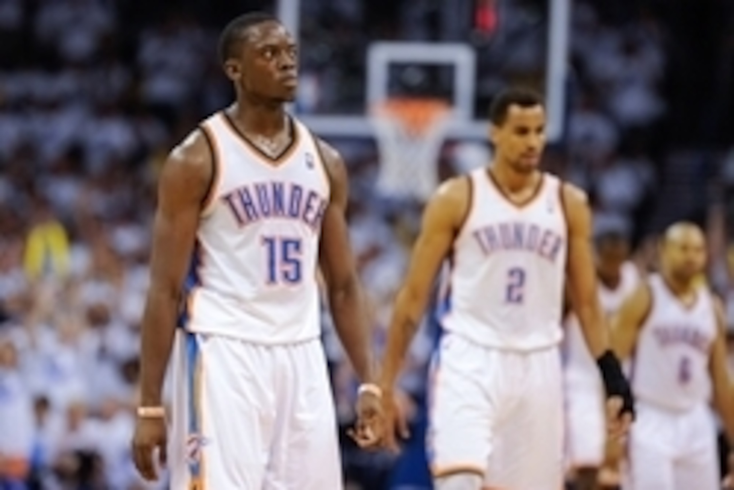 May 15, 2013; Oklahoma City, OK, USA; Oklahoma City Thunder point guard Reggie Jackson (15) and shooting guard Thabo Sefolosha (2) wait for play to resume against the Memphis Grizzlies in game five of the second round of the 2013 NBA Playoffs at Chesapeak May 15, 2013; Oklahoma City, OK, USA; Oklahoma City Thunder point guard Reggie Jackson (15) and shooting guard Thabo Sefolosha (2) wait for play to resume against the Memphis Grizzlies in game five of the second round of the 2013 NBA Playoffs at Chesapeak