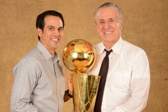 MIAMI, FL - JUNE 20:  Head Coach Erik Spoelstra and President Pat Riley of the Miami Heat poses for a portrait with the Larry O'Brien Trophy after defeating the San Antonio Spurs in Game Seven of the 2013 NBA Finals on June 20, 2013 at American Airlines A
