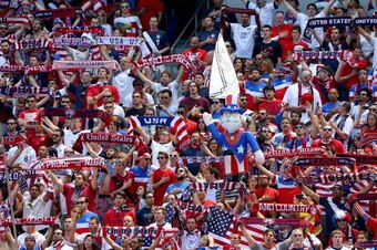 HARRISON, NJ - JUNE 01:  United States fans hold up their scarves during the national anthem before the match against Turkey during an international friendly match at Red Bull Arena on June 1, 2014 in Harrison, New Jersey.  (Photo by Elsa/Getty Images)