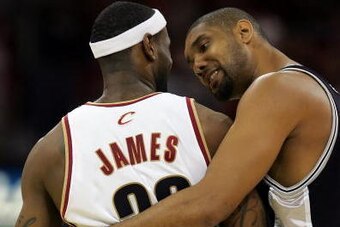 CLEVELAND - JUNE 14: Tim Duncan #21 of the San Antonio Spurs talks with LeBron James #23 of the Cleveland Cavaliers before Game Four of the NBA Finals on June 14, 2007 at the Quicken Loans Arena in Cleveland, Ohio. NOTE TO USER: User expressly acknowledge