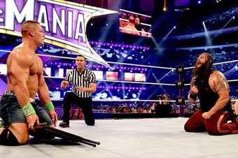 Cena contemplates hitting Wyatt with a steel chair.