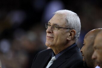 OAKLAND, CA - JANUARY 12:  Head coach Phil Jackson of the Los Angeles Lakers sits on the bench during their game against the Golden State Warriors at Oracle Arena on January 12, 2011 in Oakland, California. NOTE TO USER: User expressly acknowledges and ag