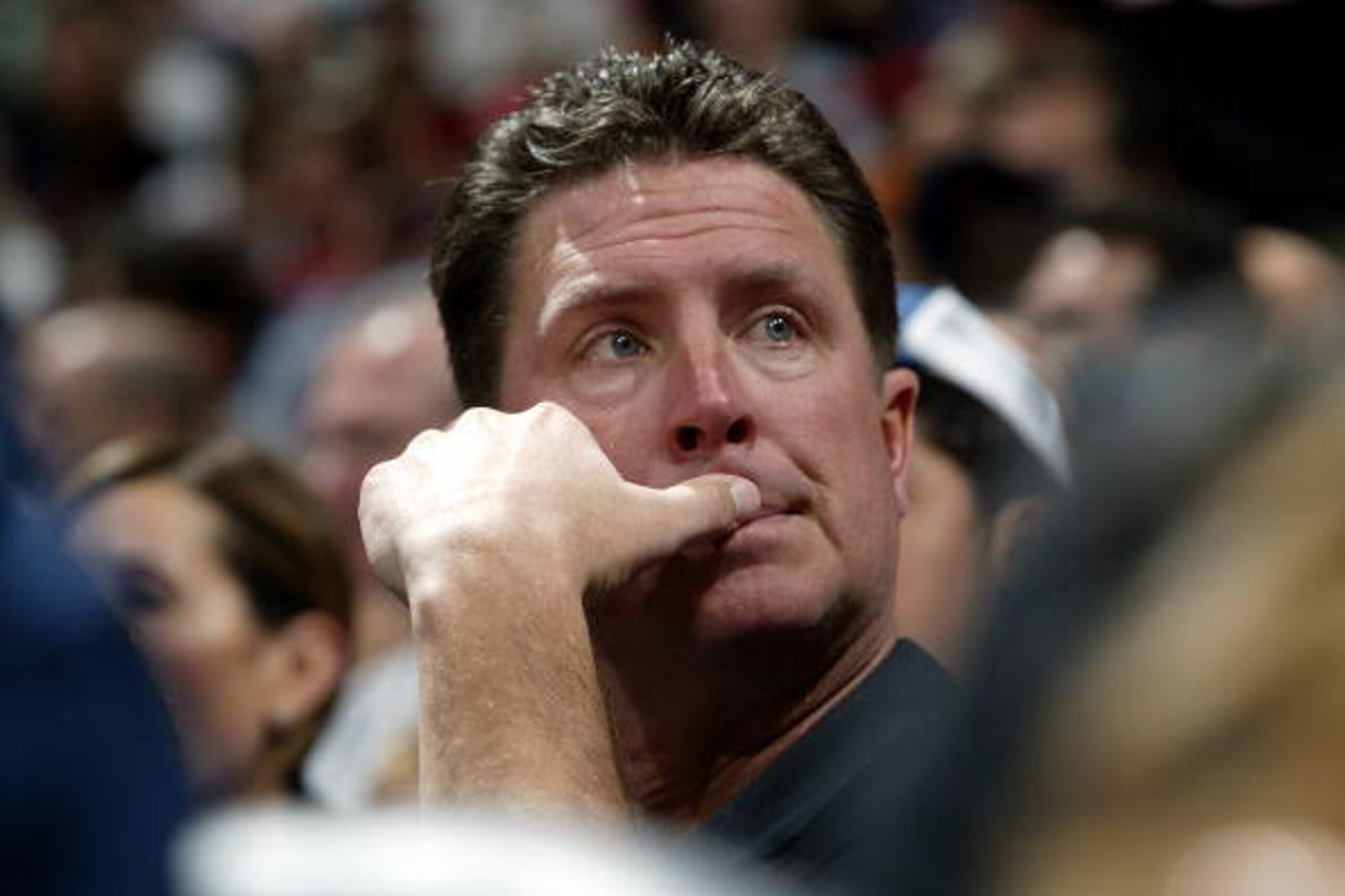 MIAMI - JANUARY 30:  Former Miami Dolphin quarterback Dan Marino watches the game between the Miami Heat and the Houston Rockets on January 30, 2005 at American Airlines Arena in Miami, Florida. The heat defeated the Rockets 104-95.  NOTE TO USER: User ex