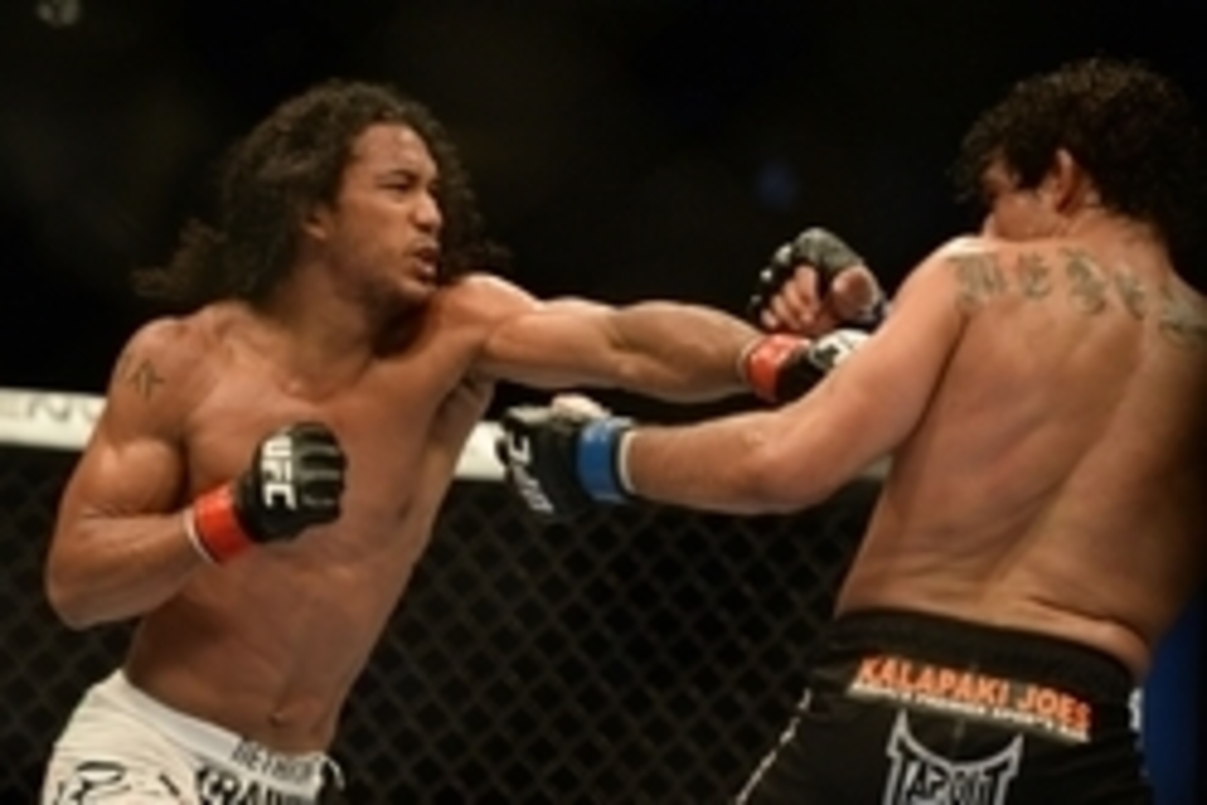 Apr 20, 2013; San Jose, CA, USA; Benson Henderson (left) fights Gilbert Melendez (right) during the lightweight championship bout of the UFC on Fuel TV at HP Pavilion. Mandatory Credit: Kyle Terada-USA TODAY Sports Apr 20, 2013; San Jose, CA, USA; Benson Henderson (left) fights Gilbert Melendez (right) during the lightweight championship bout of the UFC on Fuel TV at HP Pavilion. Mandatory Credit: Kyle Terada-USA TODAY Sports