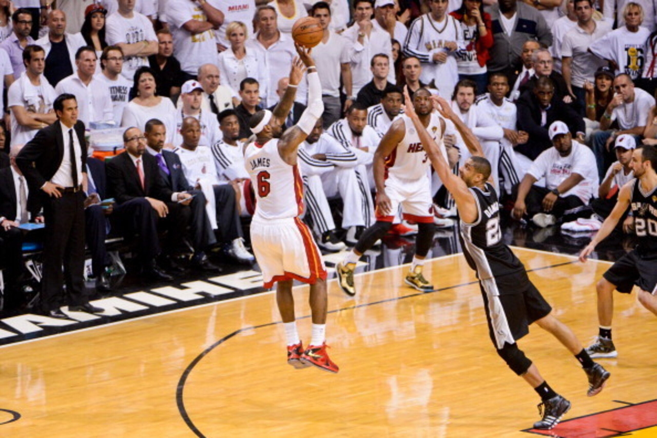 MIAMI, FL - JUNE 20: LeBron James #6 of the Miami Heat shoots against Tim Duncan #21 of the San Antonio Spurs during Game Seven of the 2013 NBA Finals on June 20, 2013 at American Airlines Arena in Miami, Florida. NOTE TO USER: User expressly acknowledges