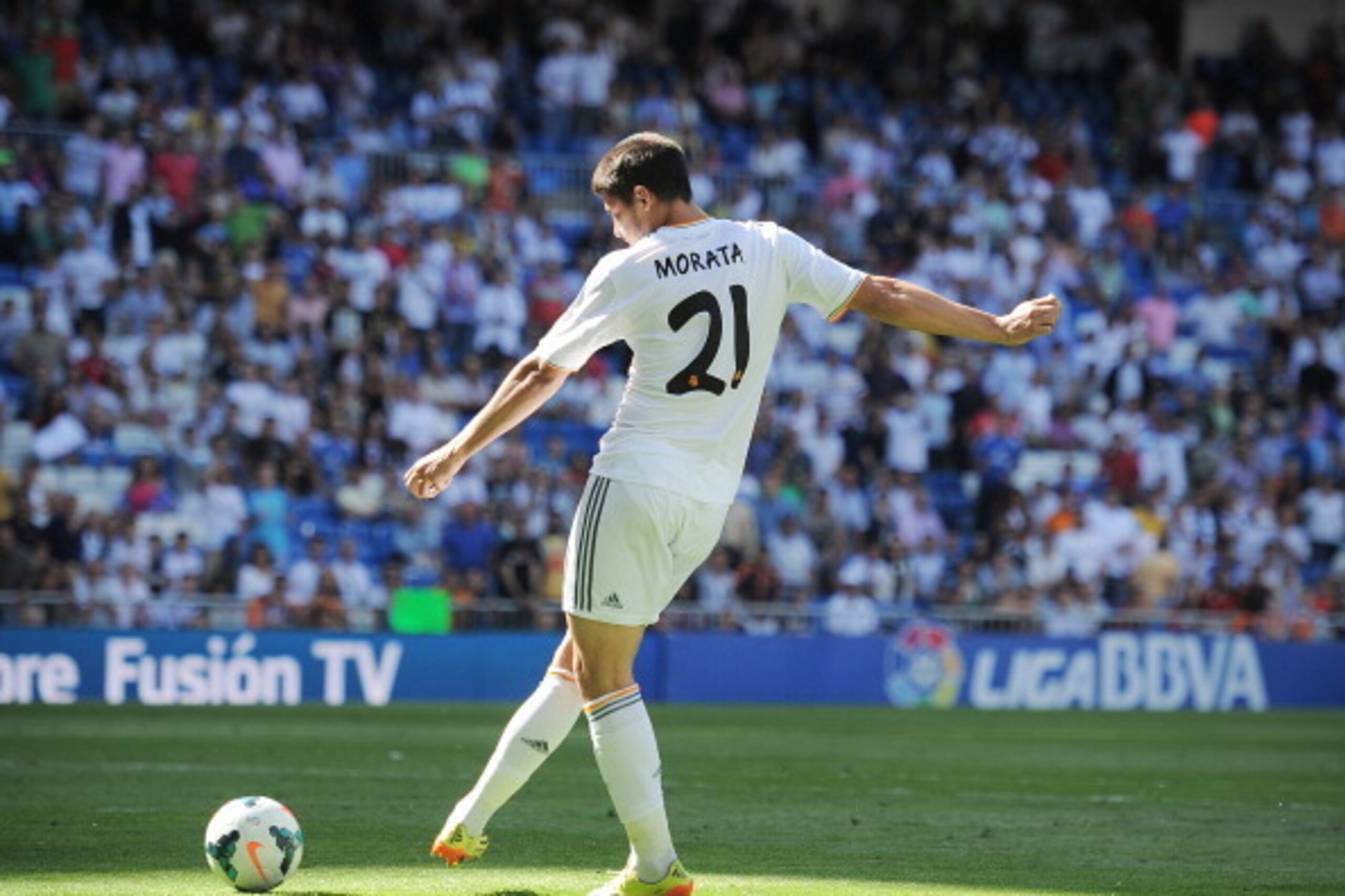 MADRID, SPAIN - MAY 17:  Alvaro Morata of Real Madrid FC scores Real's third goal during the La Liga match between Real Madrid CF and RCD Espanyol at Santiago Bernabeu stadium on May 17, 2014 in Madrid, Spain.  (Photo by Denis Doyle/Getty Images)