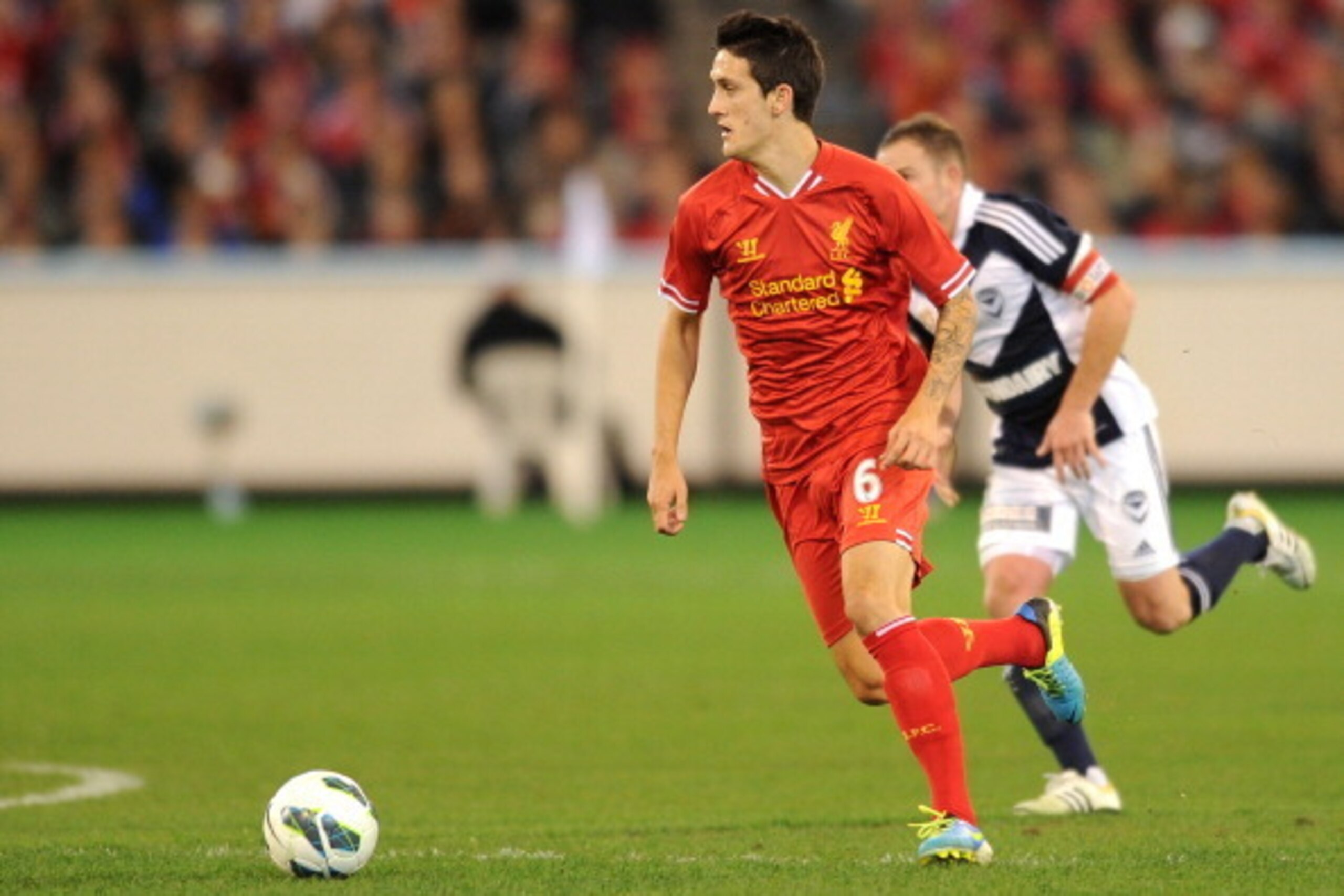 MELBOURNE, AUSTRALIA - JULY 24:  Luis Alberto looks to pass the ball during the match between the Melbourne Victory and Liverpool at Melbourne Cricket Ground on July 24, 2013 in Melbourne, Australia.  (Photo by Vince Caligiuri/Getty Images)