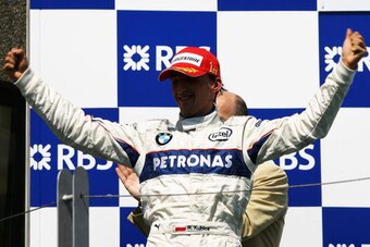 MONTREAL, QC - JUNE 08:  Robert Kubica of Poland and BMW Sauber celebrates on the podium following his victory in the Canadian Formula One Grand Prix at the Circuit Gilles Villeneuve June 8, 2008 in Montreal, Canada.  (Photo by Paul Gilham/Getty Images)