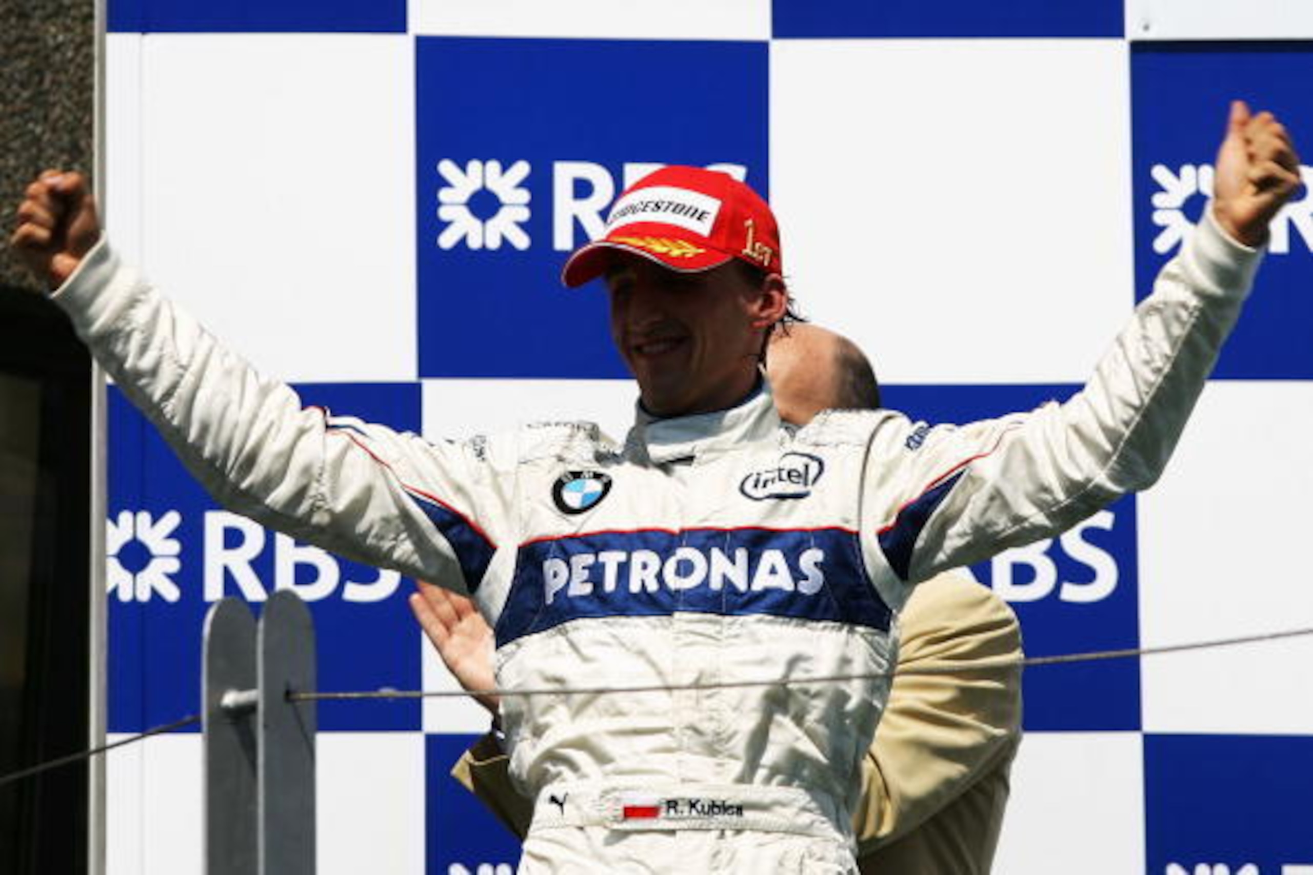 MONTREAL, QC - JUNE 08: Robert Kubica of Poland and BMW Sauber celebrates on the podium following his victory in the Canadian Formula One Grand Prix at the Circuit Gilles Villeneuve June 8, 2008 in Montreal, Canada. (Photo by Paul Gilham/Getty Images) MONTREAL, QC - JUNE 08: Robert Kubica of Poland and BMW Sauber celebrates on the podium following his victory in the Canadian Formula One Grand Prix at the Circuit Gilles Villeneuve June 8, 2008 in Montreal, Canada. (Photo by Paul Gilham/Getty Images)