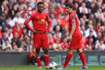 LIVERPOOL, ENGLAND - MARCH 30:  Luis Suarez (R) and Daniel Sturridge of Liverpool prepare to kick off during the Barclays Premier League match between Liverpool and Tottenham Hotspur at Anfield on March 30, 2014 in Liverpool, England.  (Photo by Alex Live