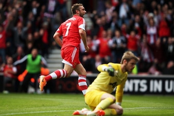 SOUTHAMPTON, ENGLAND - MAY 11:  Rickie Lambert of Southampton celebrates scoring during the Barclays Premier League match between Southampton and Manchester United at St Mary's Stadium on May 11, 2014 in Southampton, England.  (Photo by Ian Walton/Getty I