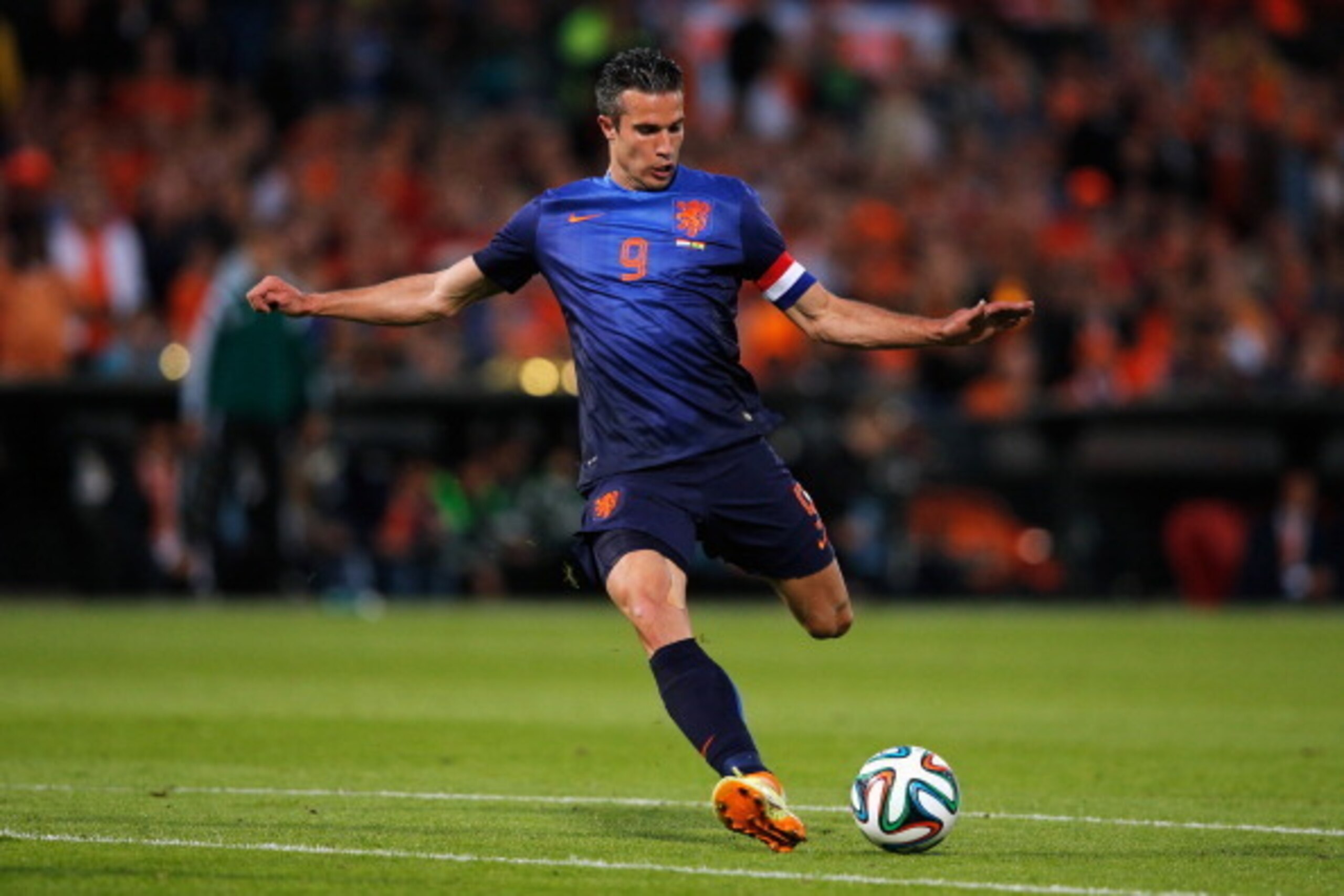 ROTTERDAM, NETHERLANDS - MAY 31:  Robin Van Persie of Netherlands in action during the International Friendly match between Netherlands and Ghana at De Kuip on May 31, 2014 in Rotterdam, Netherlands.  (Photo by Dean Mouhtaropoulos/Getty Images)