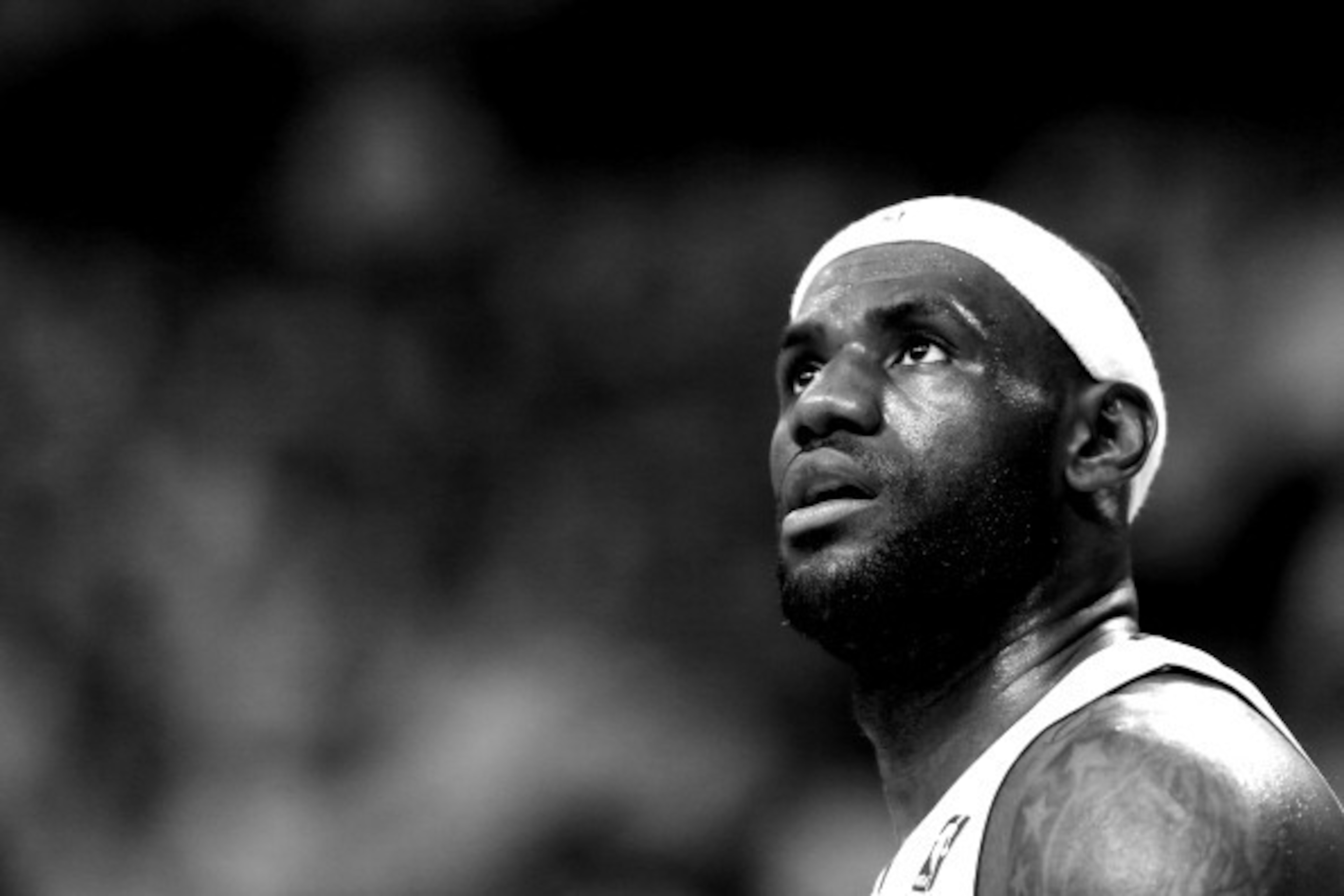 MIAMI, FL - MAY 30: (EDITORS NOTE: Image has been converted to black and white) LeBron James #6 of the Miami Heat looks on against the Indiana Pacers during Game Six of the Eastern Conference Finals of the 2014 NBA Playoffs at American Airlines Arena on M