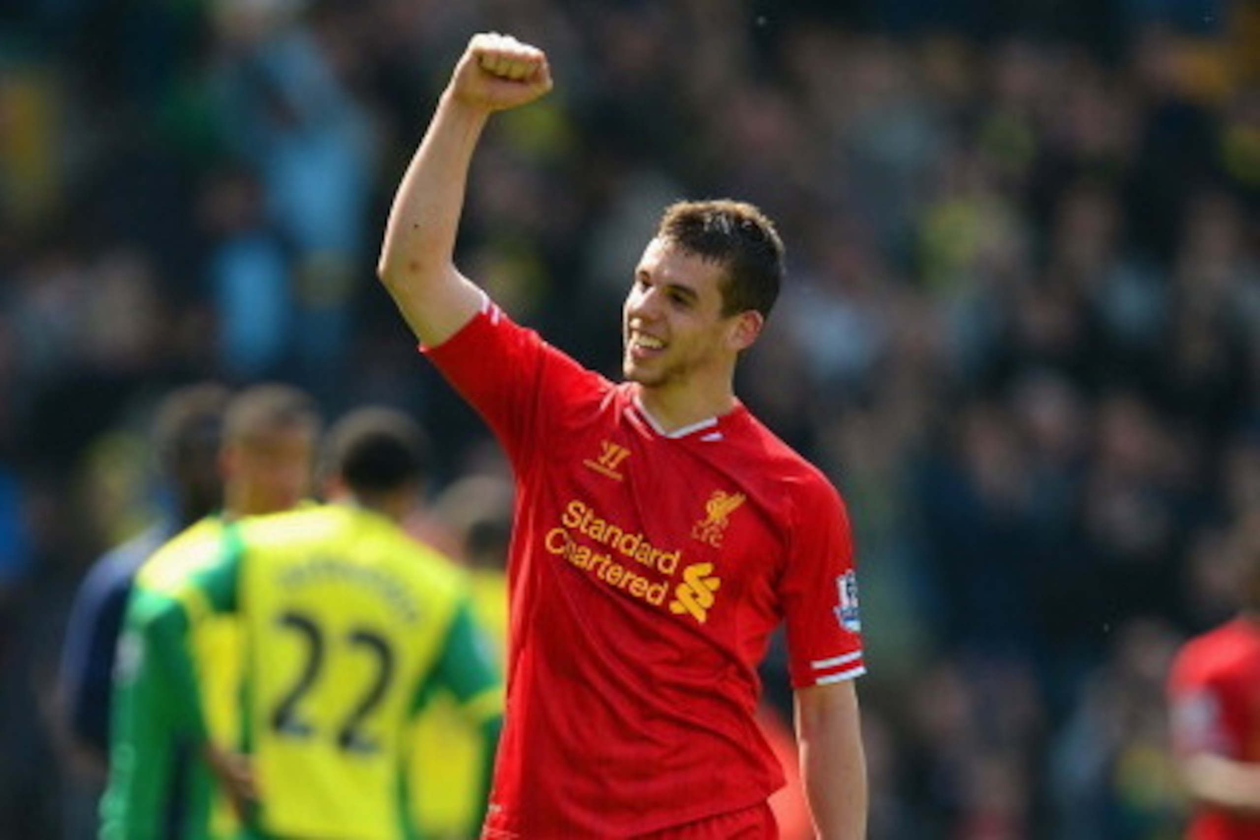 NORWICH, ENGLAND - APRIL 20:  Jon Flanagan of Liverpool celebrates victory at the final whistle during the Barclays Premier League match between Norwich City and Liverpool at Carrow Road on April 20, 2014 in Norwich, England.  (Photo by Jamie McDonald/Get
