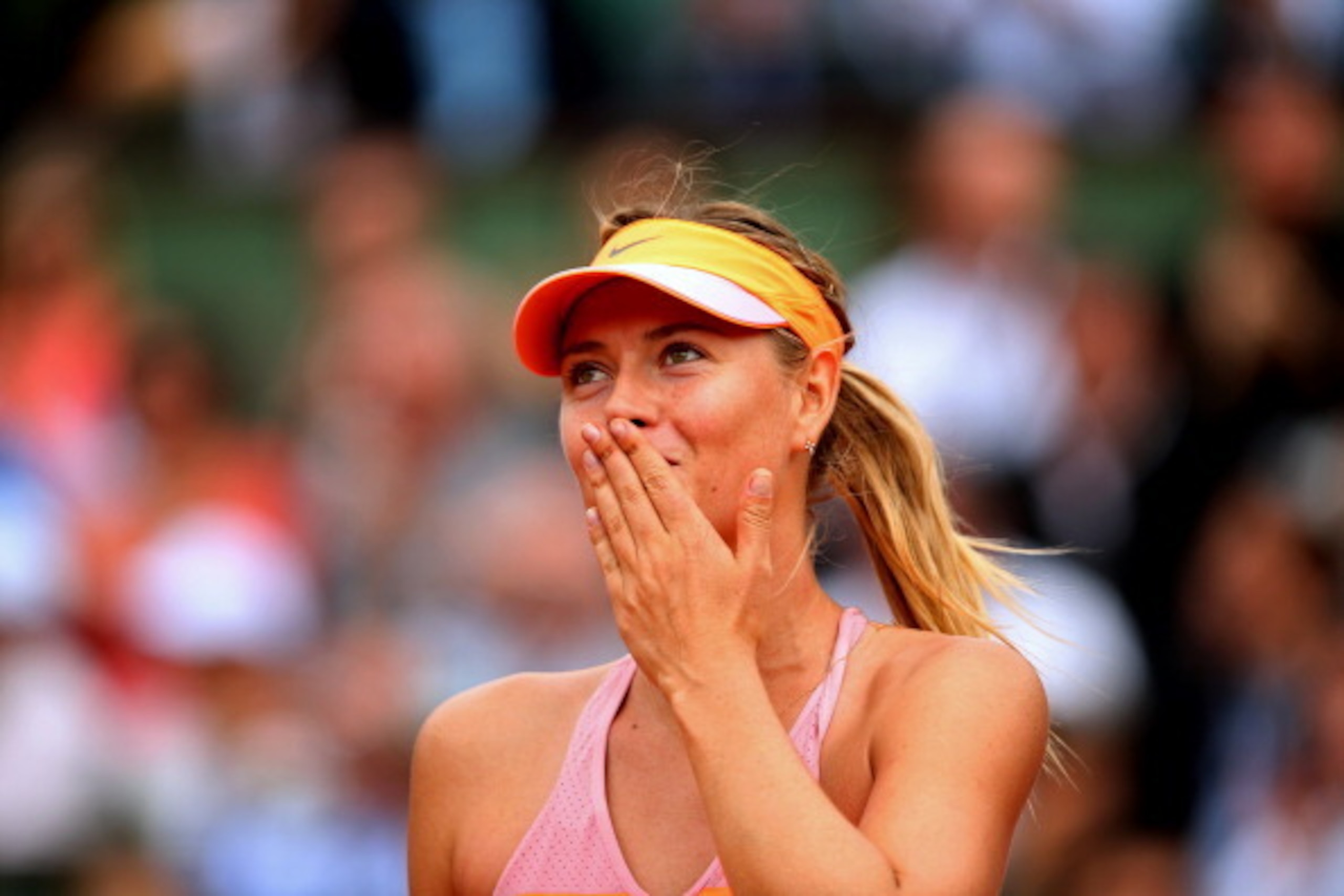 PARIS, FRANCE - JUNE 03: Maria Sharapova of Russia celebrates victory during her women's singles match against Garbine Muguruza of Spain on day ten of the French Open at Roland Garros on June 3, 2014 in Paris, France. (Photo by Clive Brunskill/Getty Ima PARIS, FRANCE - JUNE 03: Maria Sharapova of Russia celebrates victory during her women's singles match against Garbine Muguruza of Spain on day ten of the French Open at Roland Garros on June 3, 2014 in Paris, France. (Photo by Clive Brunskill/Getty Ima