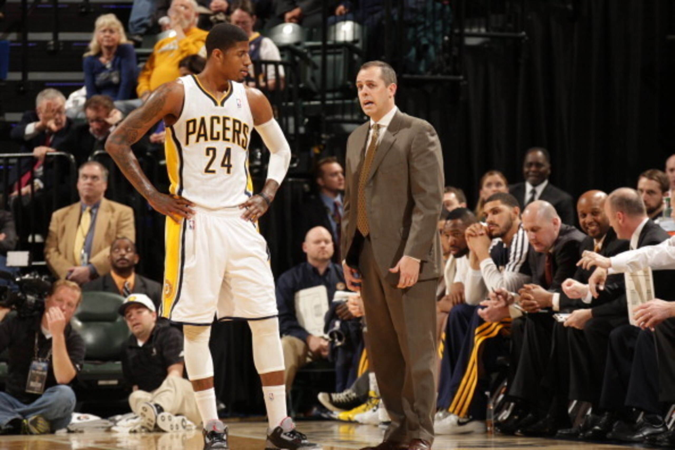INDIANAPOLIS, IN - MARCH 13:  Paul George #24 of the Indiana Pacers and Head Coach Frank Vogel of the Indiana Pacers during the game between the Indiana Pacers and the Minnesota Timberwolves on March 13, 2013 at Bankers Life Fieldhouse in Indianapolis, In