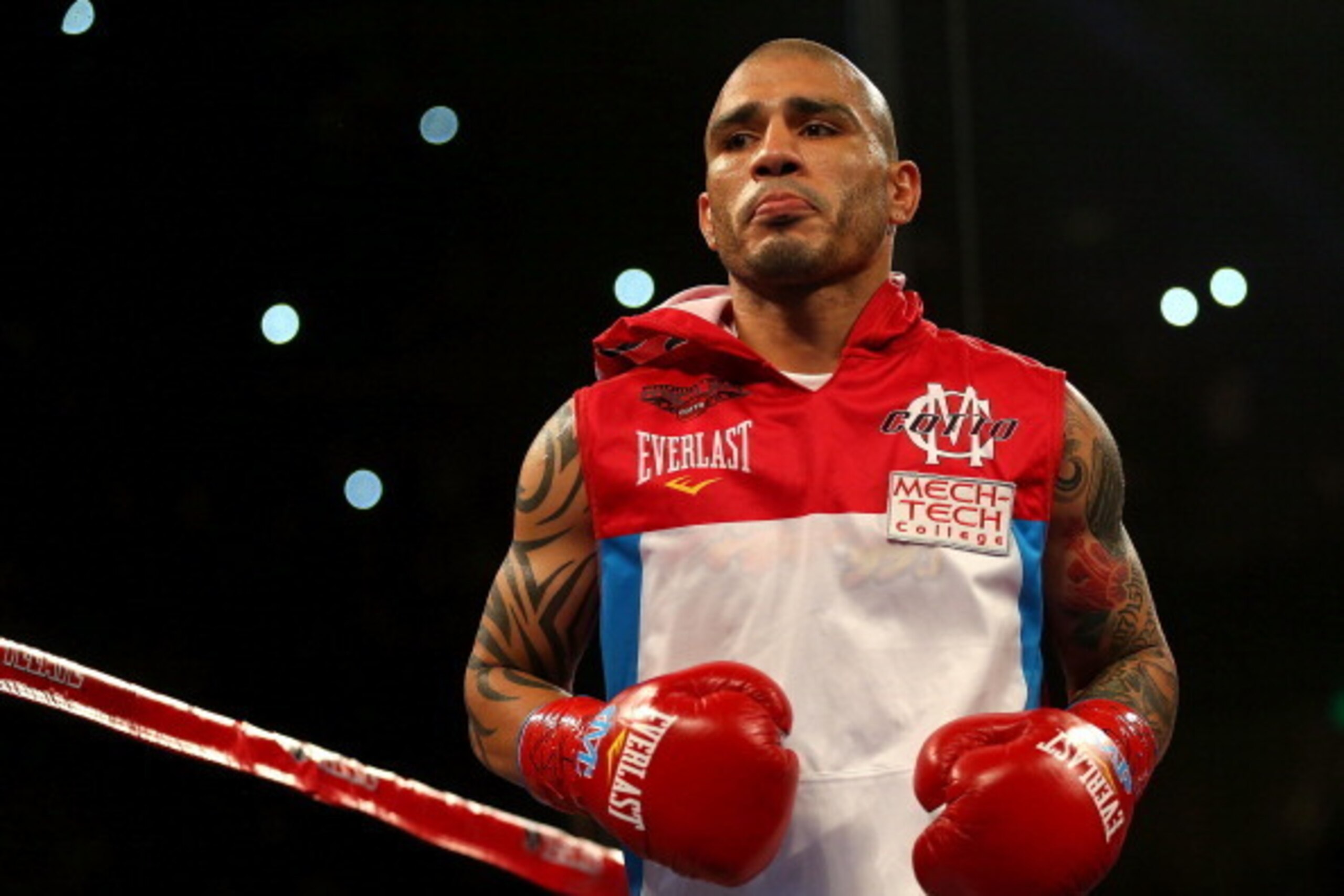 ORLANDO, FL - OCTOBER 05: Miguel Cotto looks on during a Super Welterweight bout against Delvin Rodriguez at Amway Center on October 5, 2013 in Orlando, Florida. (Photo by Mike Ehrmann/Getty Images) ORLANDO, FL - OCTOBER 05: Miguel Cotto looks on during a Super Welterweight bout against Delvin Rodriguez at Amway Center on October 5, 2013 in Orlando, Florida. (Photo by Mike Ehrmann/Getty Images)