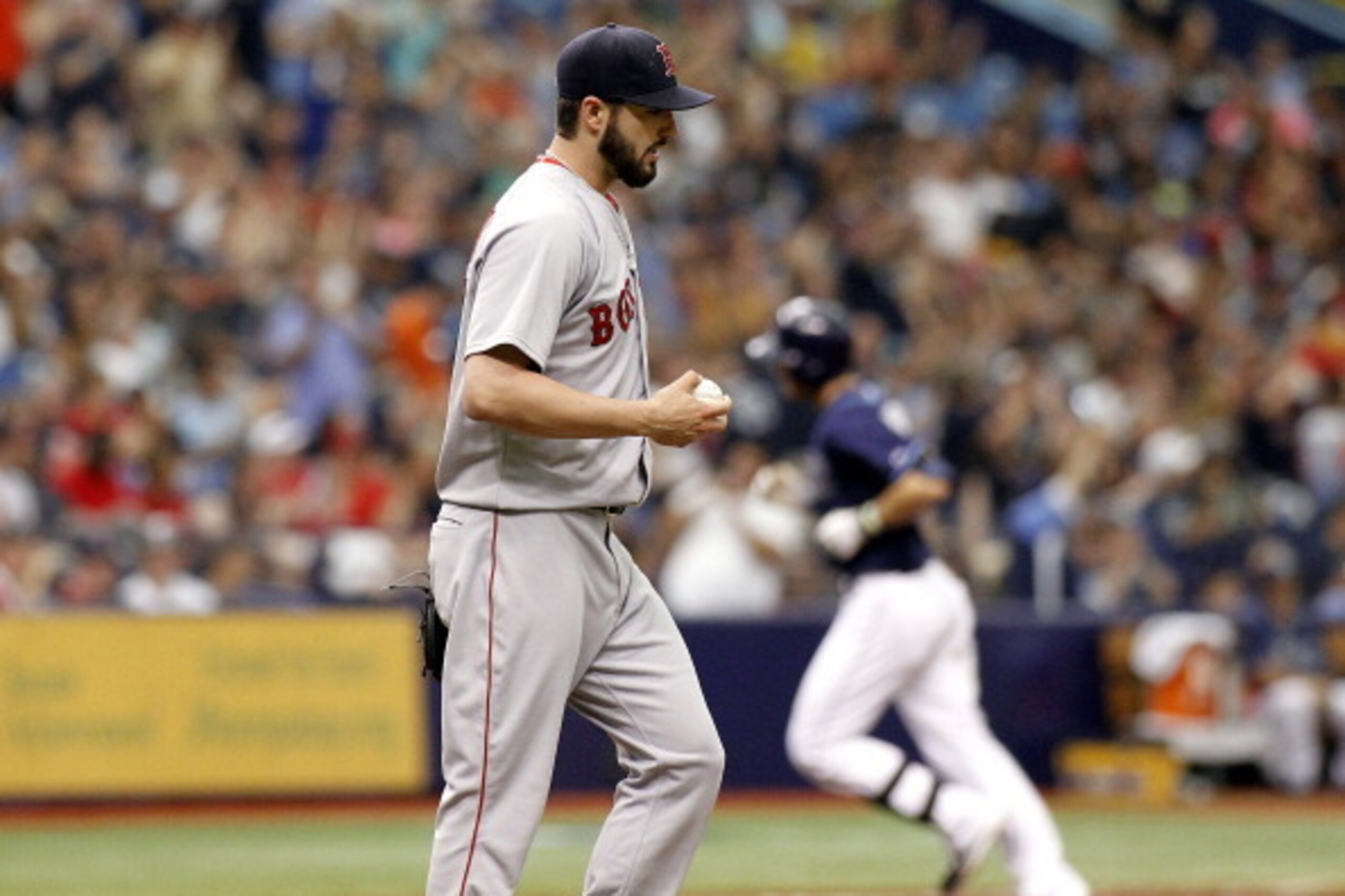 ST. PETERSBURG, FL - MAY 25:  Pitcher Brandon Workman #67 of the Boston Red Sox reacts on the mound after giving up a solo home run to Evan Longoria of the Tampa Bay Rays during the fourth inning of a game on May 25, 2014 at Tropicana Field in St. Petersb
