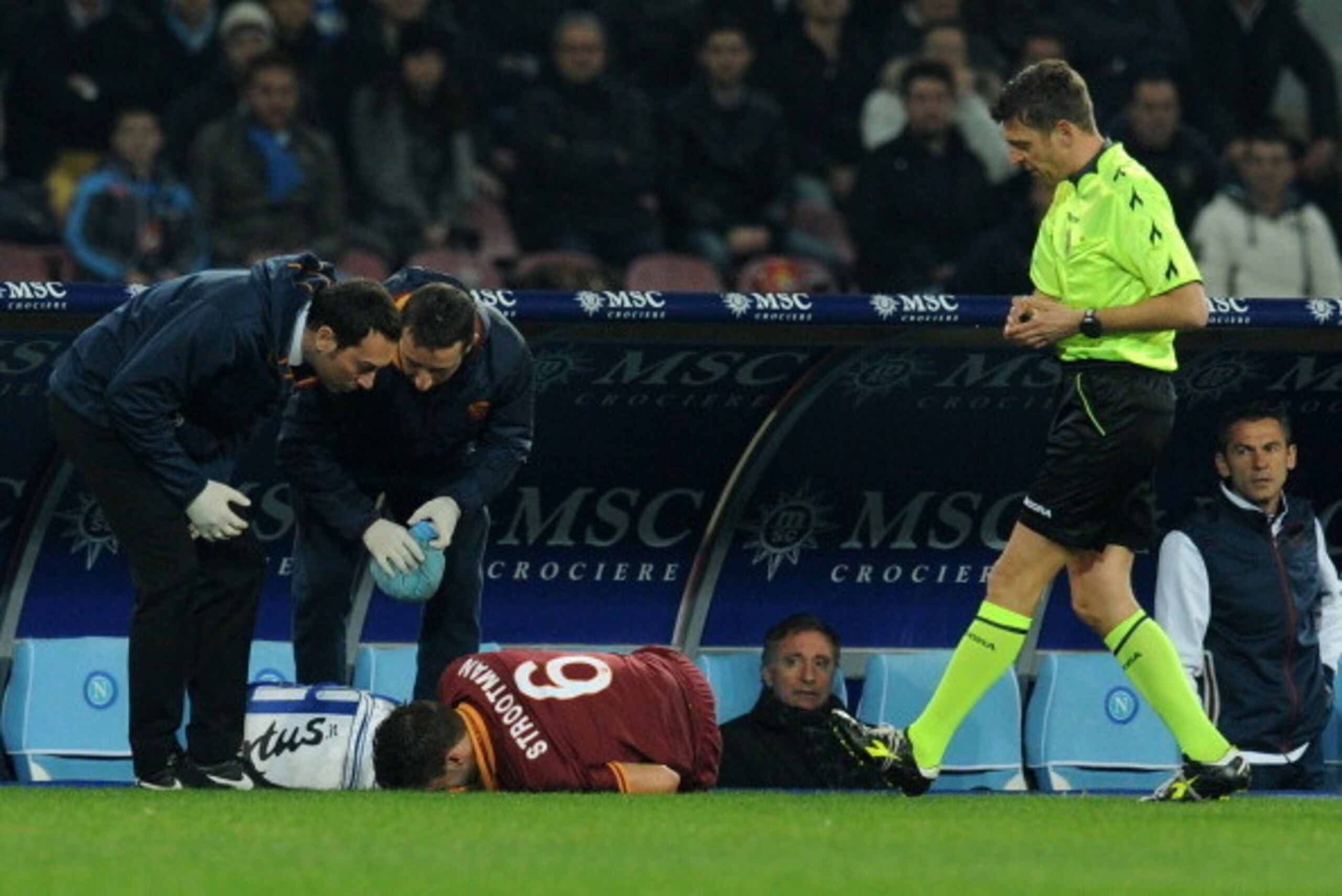 NAPLES, ITALY - MARCH 09:  Kevin Strootman of Roma lies injured on the pitch during the Serie A match between SSC Napoli and AS Roma at Stadio San Paolo on March 9, 2014 in Naples, Italy.  (Photo by Giuseppe Bellini/Getty Images)