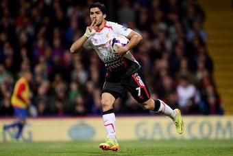 LONDON, ENGLAND - MAY 05:  Luis Suarez of Liverpool celebrates after scoring his team' sthird goal during the Barclays Premier League match between Crystal Palace and Liverpool at Selhurst Park on May 5, 2014 in London, England.  (Photo by Jamie McDonald/